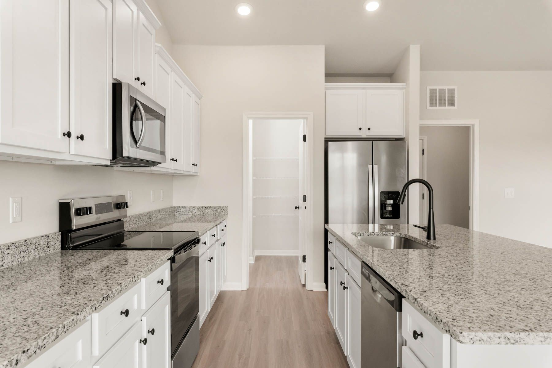 The kitchen comes with stainless steel appliances