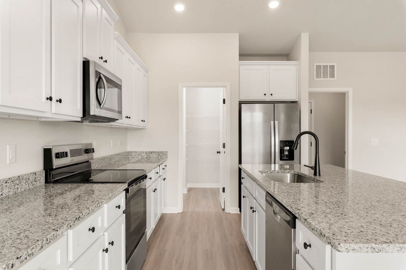 The kitchen comes with stainless steel appliances