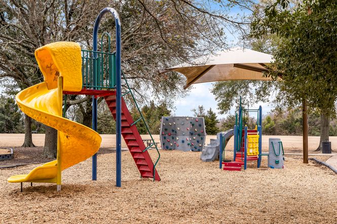 Arlie E. White Memorial Park has an exciting playground with slides and a rock climbing wall.