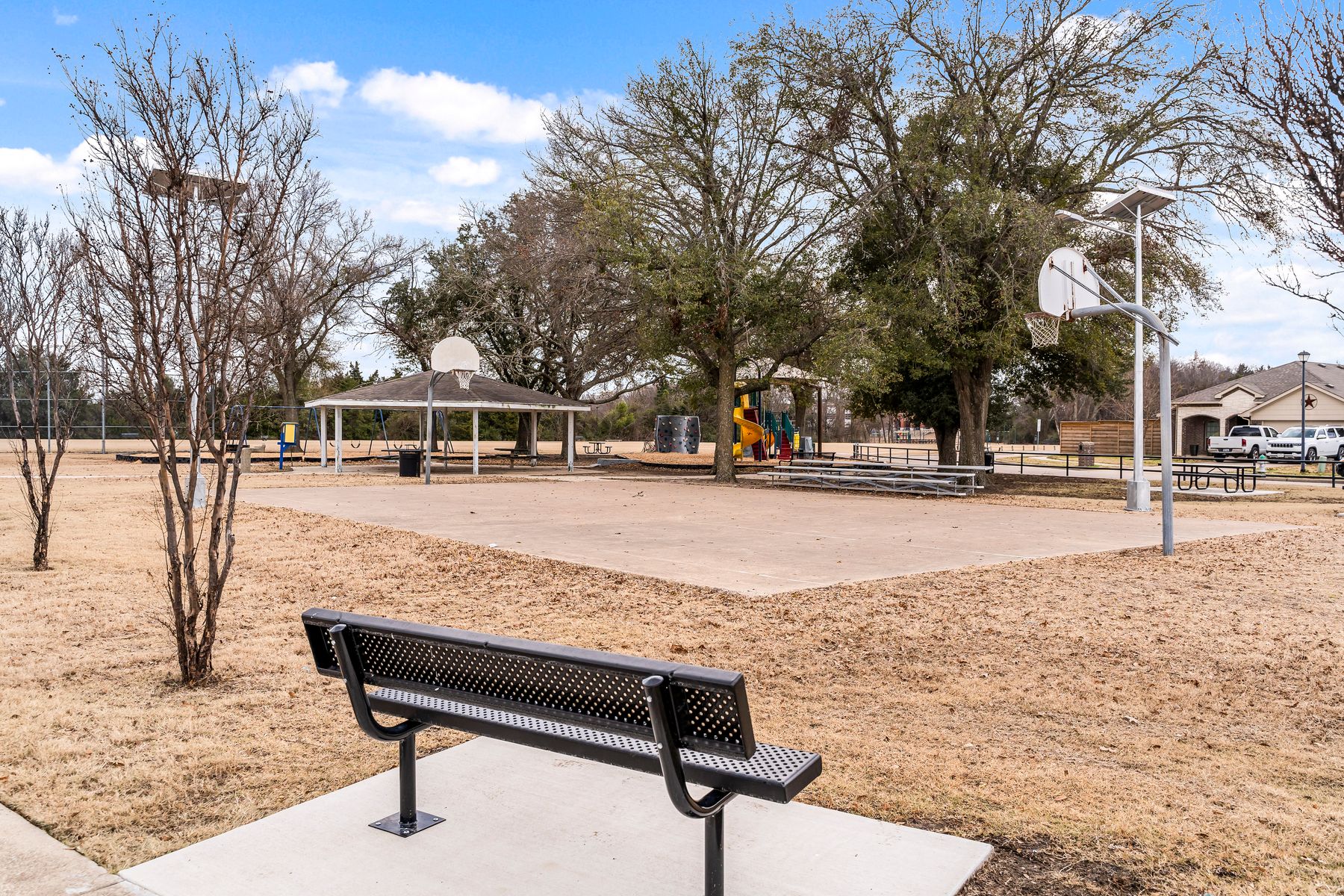 Arlie E. White Memorial Park has a basketball court.