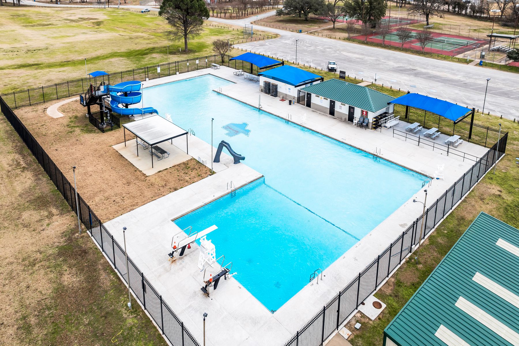 The gorgeous pool at Ben Gill Park has multiple slides and diving boards.
