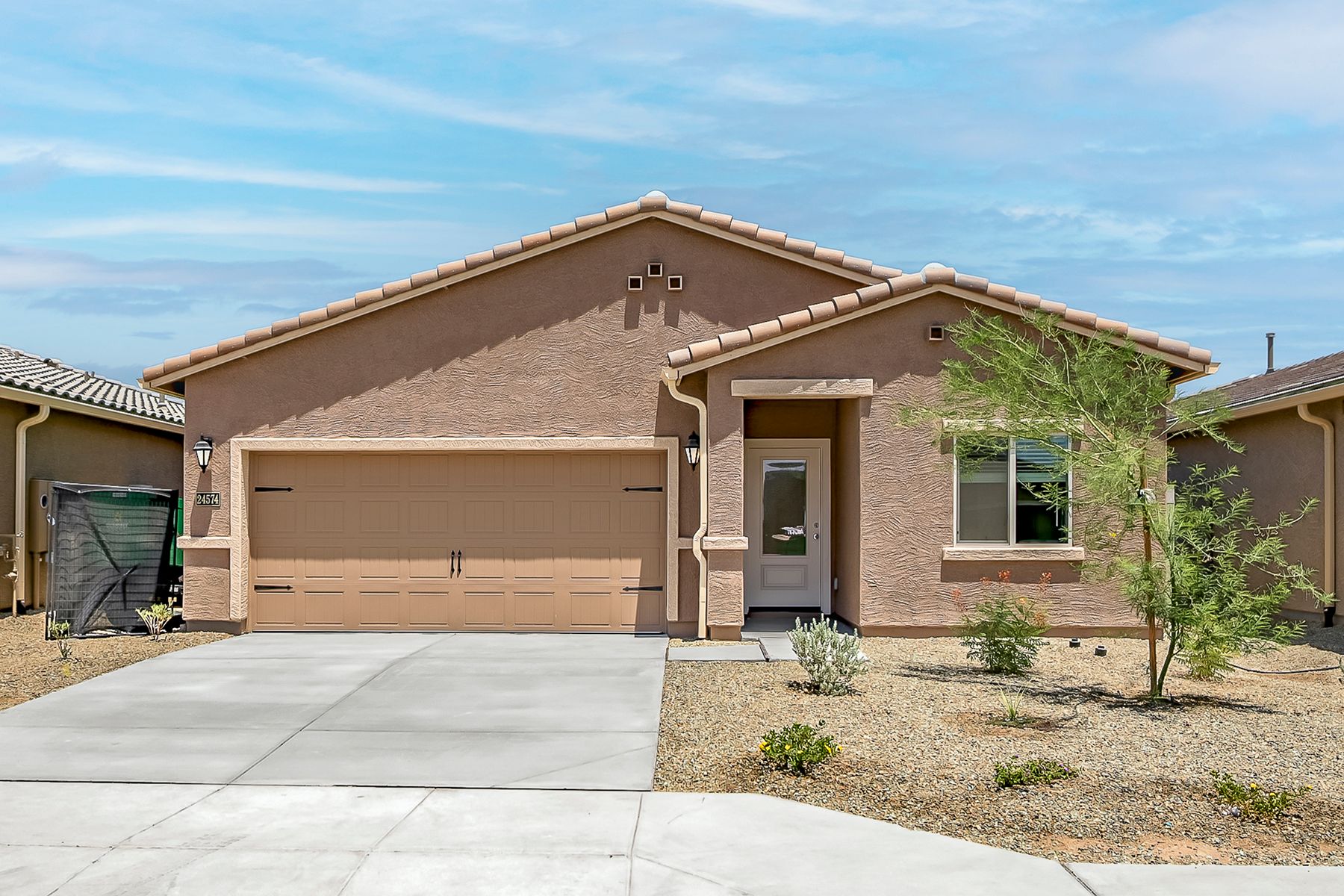 This home features a beautiful stucco exterior and a two-car garage!
