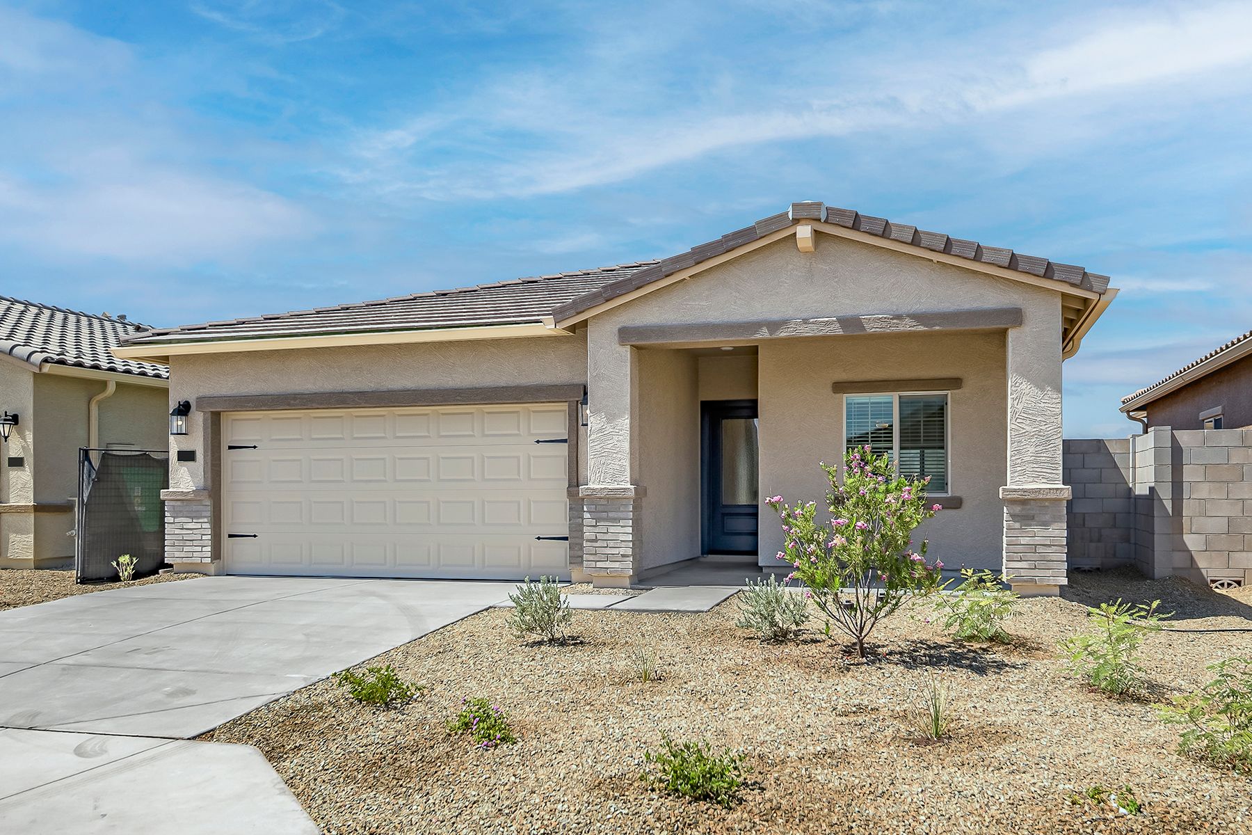 This homes offers a spacious 2-car garage.