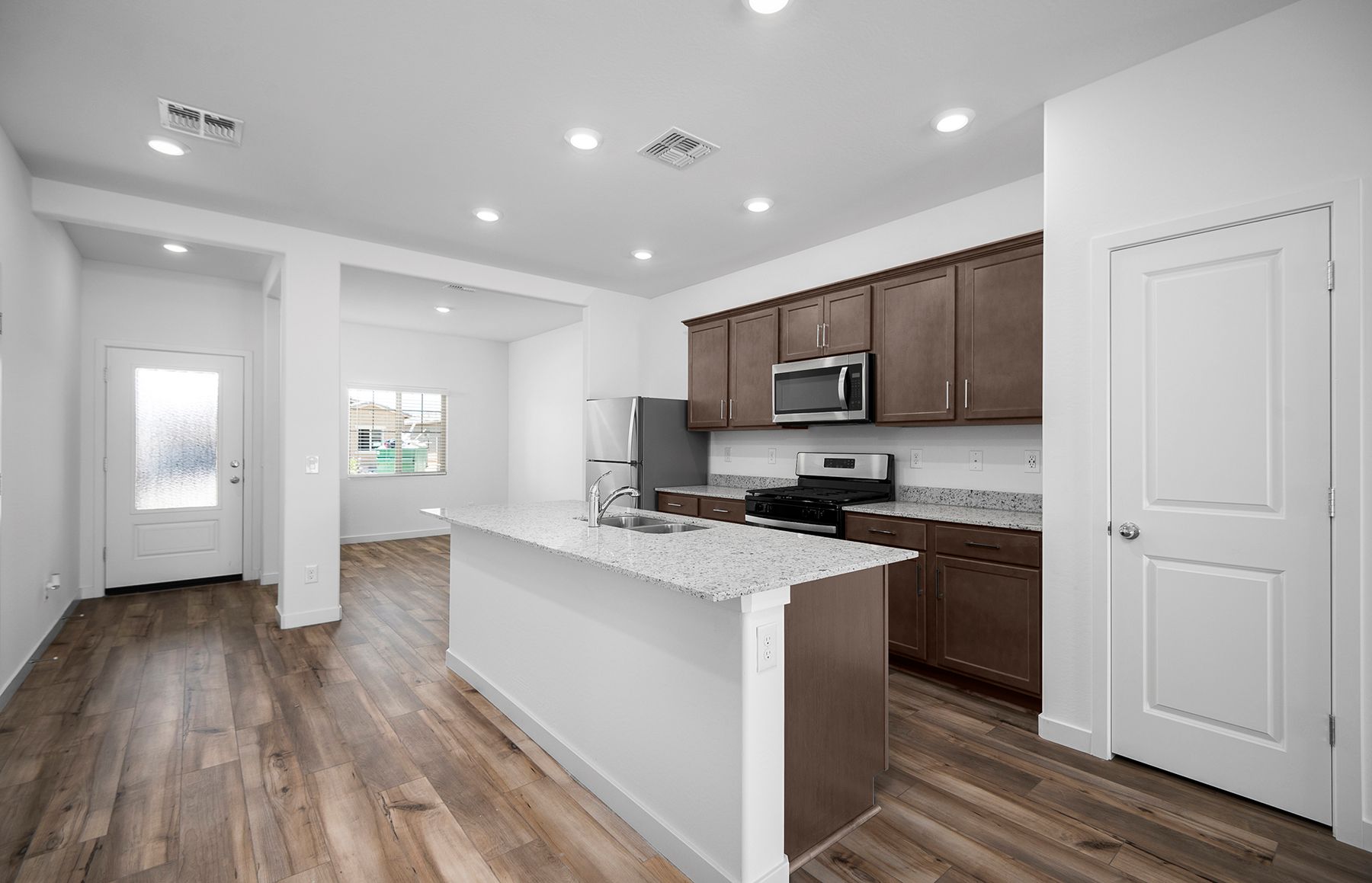 The kitchen of the Bisbee has beautiful granite countertops and stainless -steel appliances.