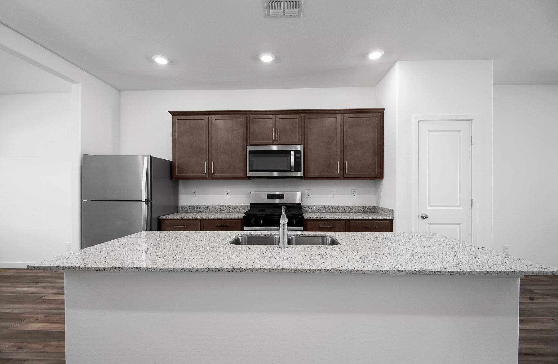 Enjoy a quick meal at the spacious kitchen bar.