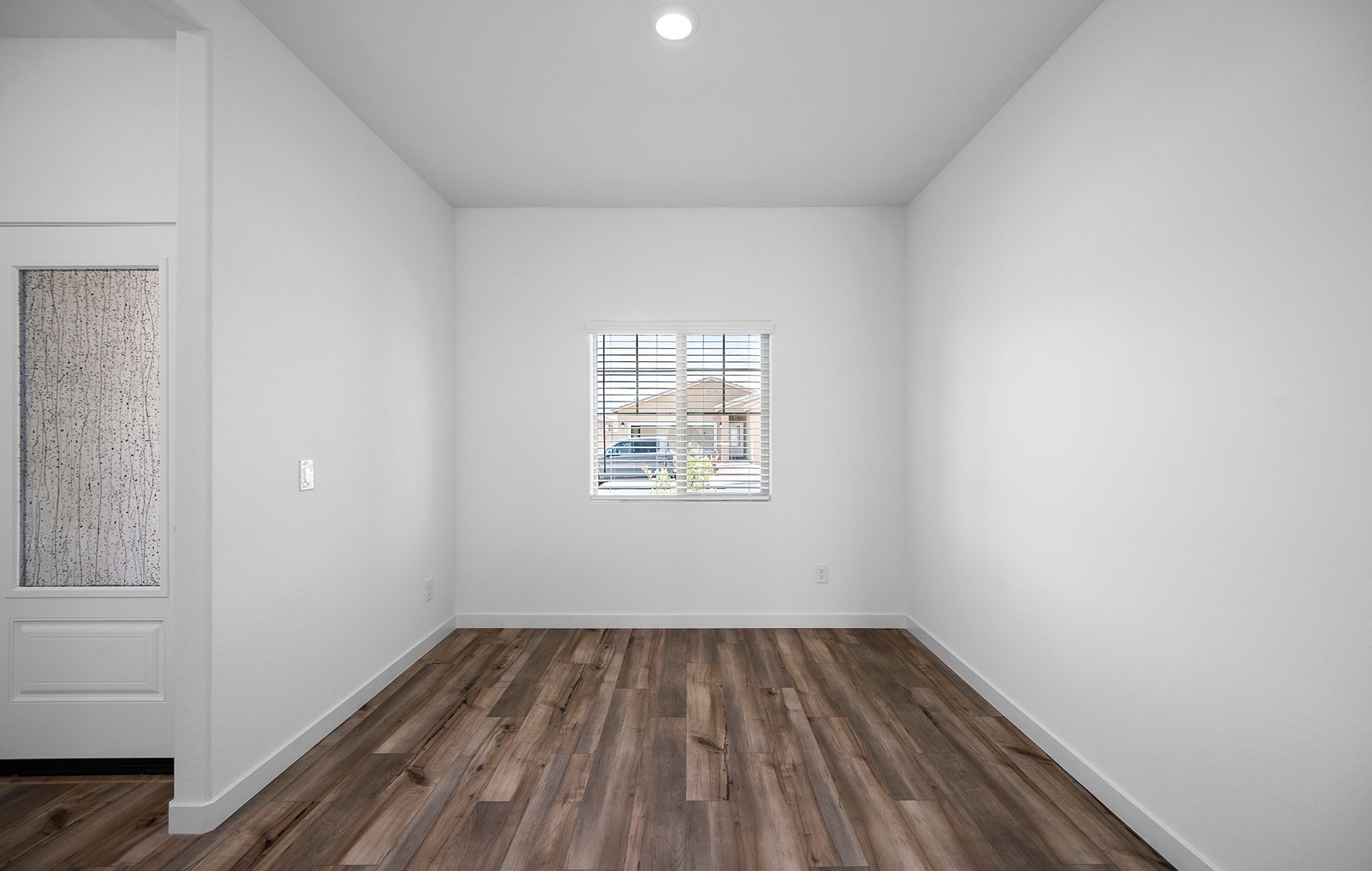 The formal dining room at the front of the house offers an elegant space for meals and gatherings