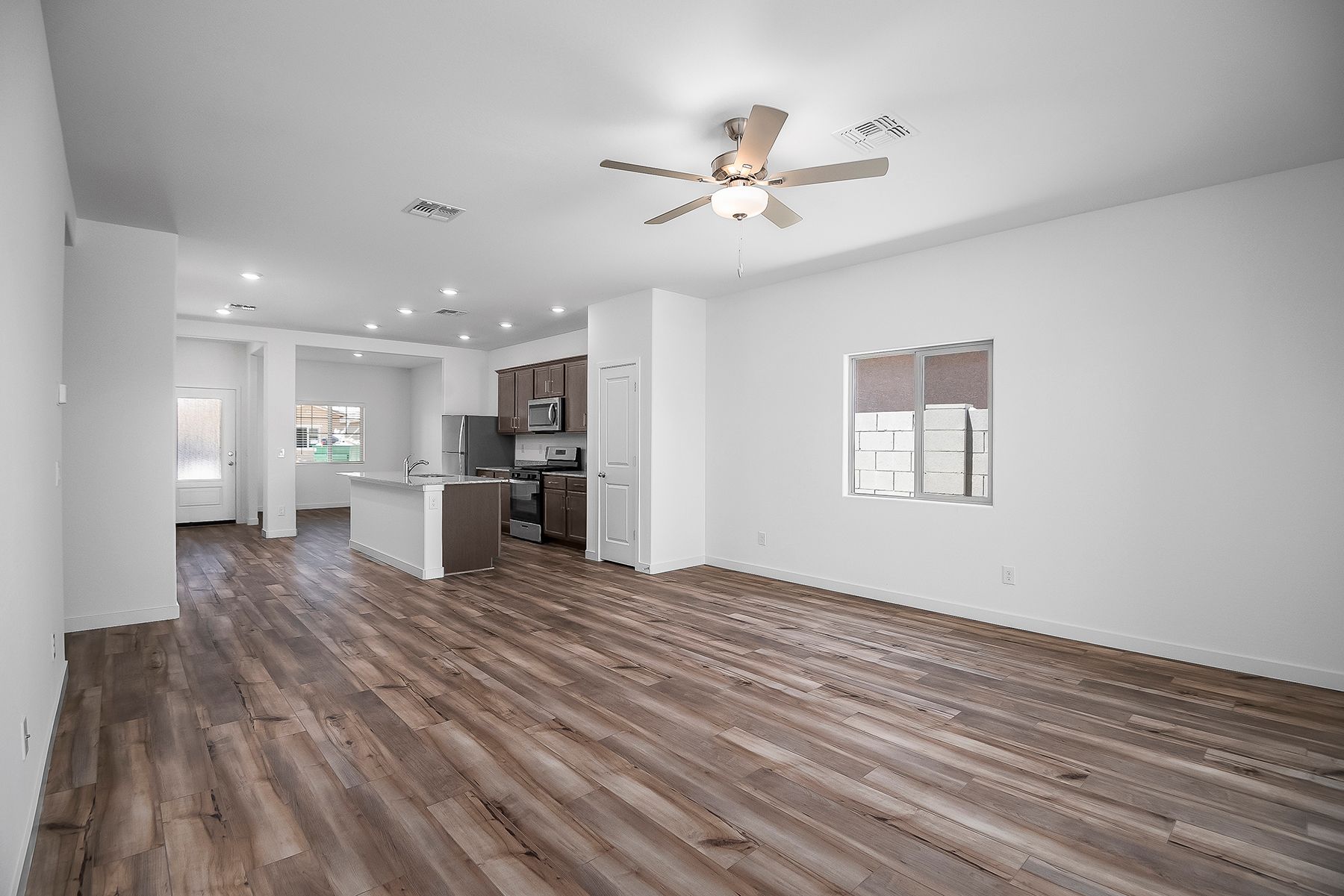 Multiple windows throughout the house let natural light flow in.