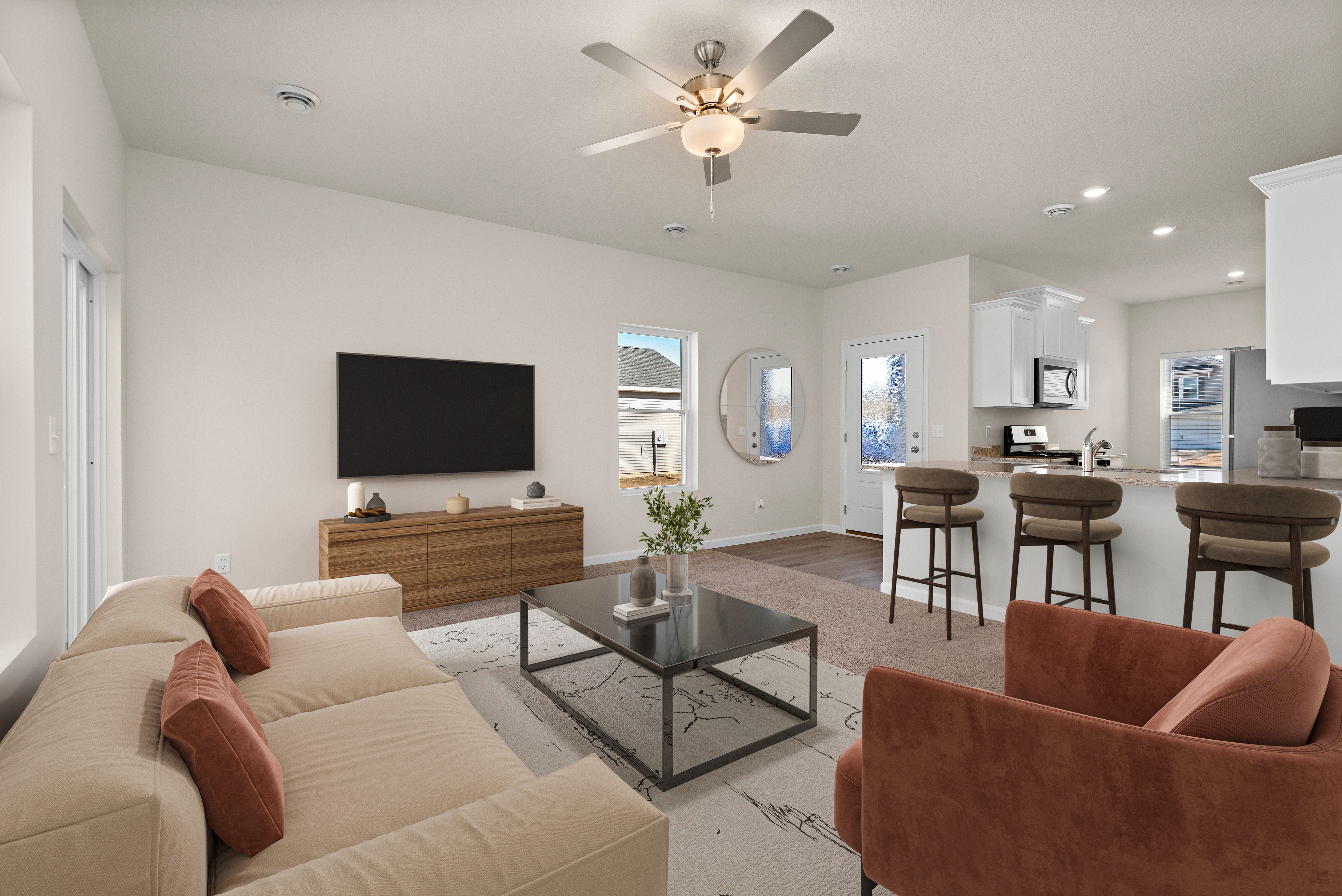 The family rooms are spacious with a ceiling fan.