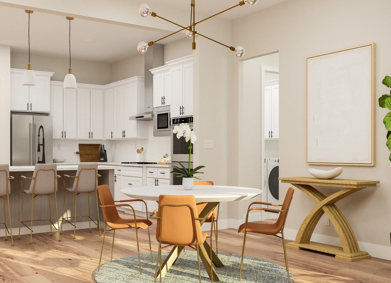 The kitchen and dining room sit adjacent to one another.