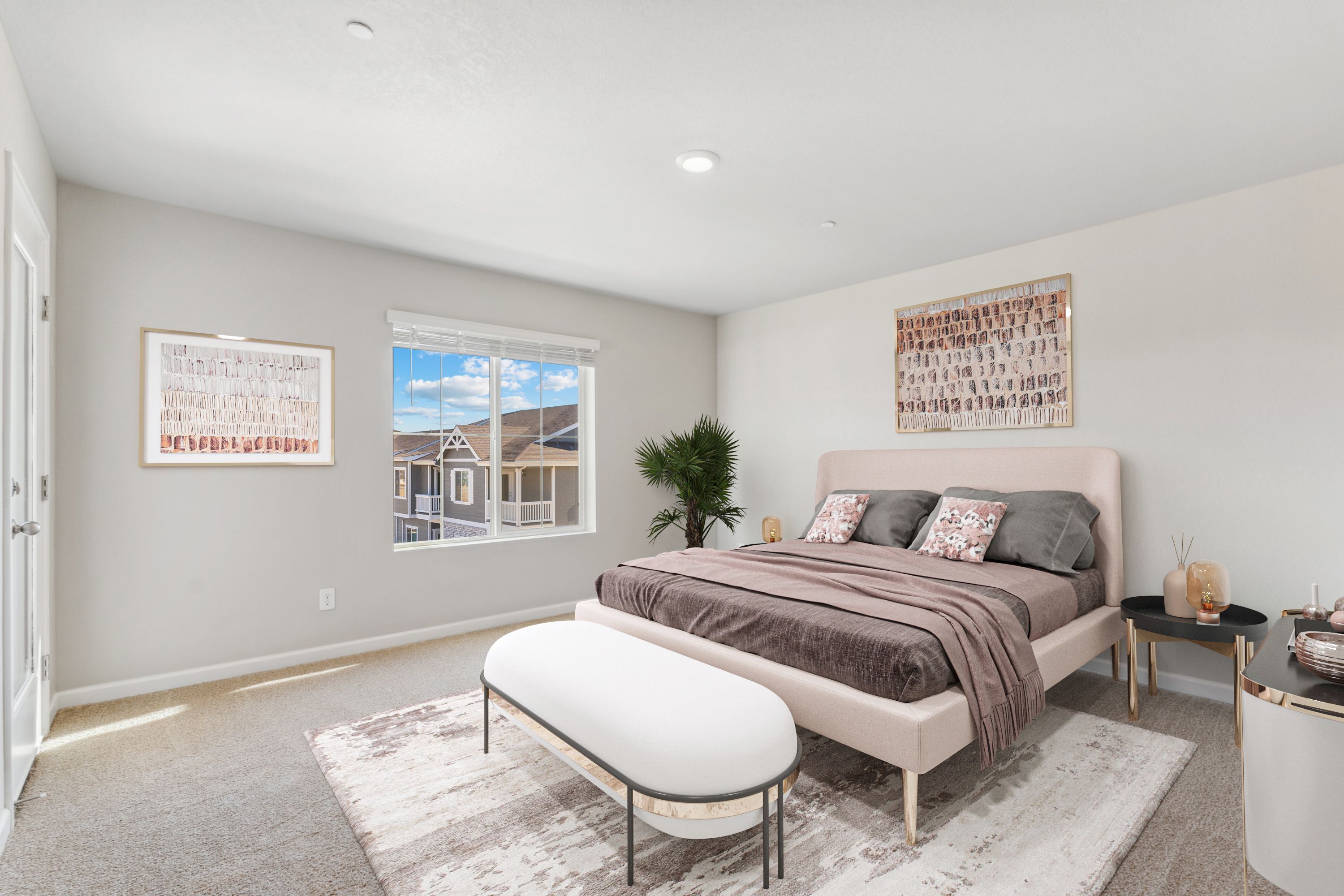 The master bedroom is spacious and has access to a deck.