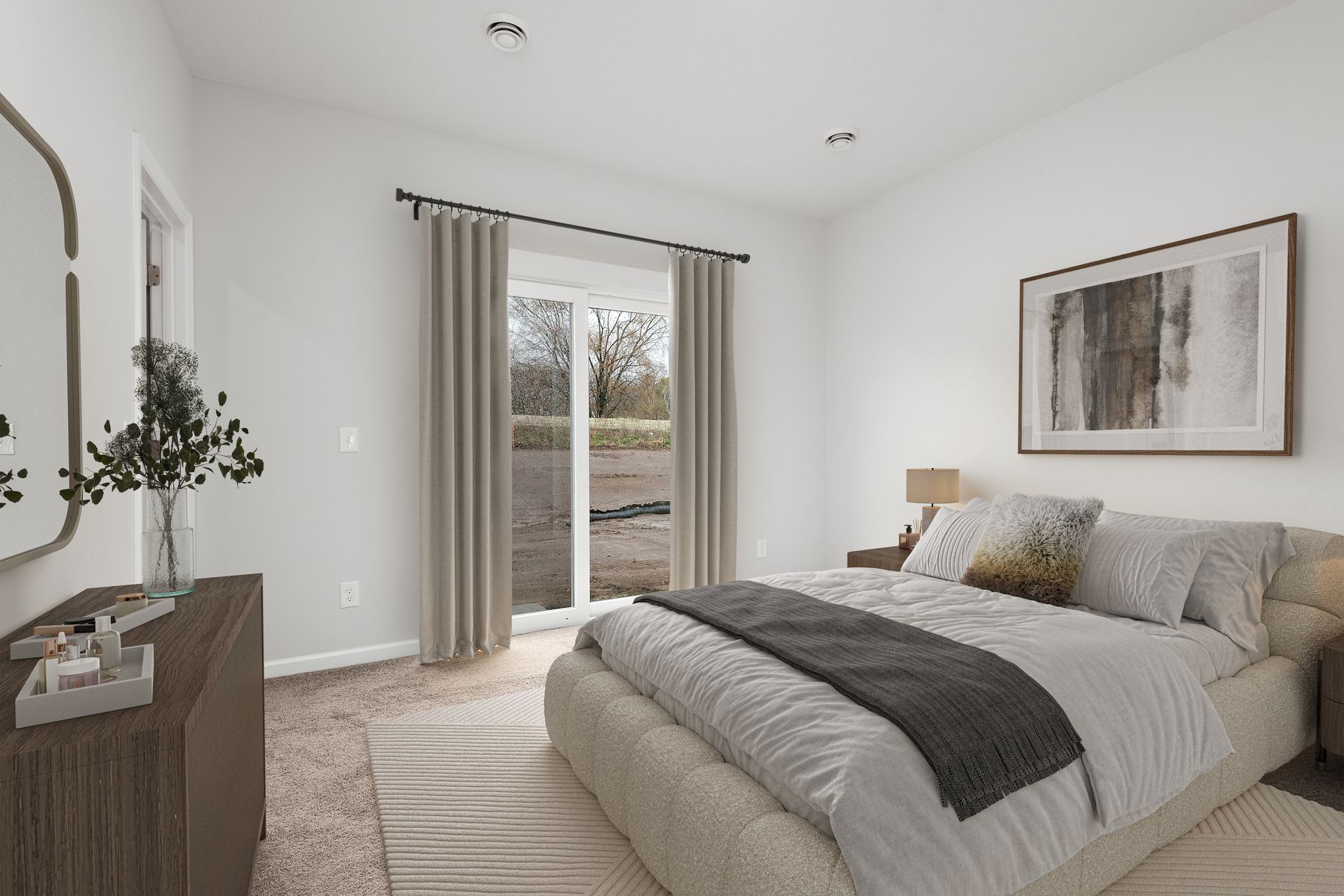The master bedroom is spacious and has carpet.