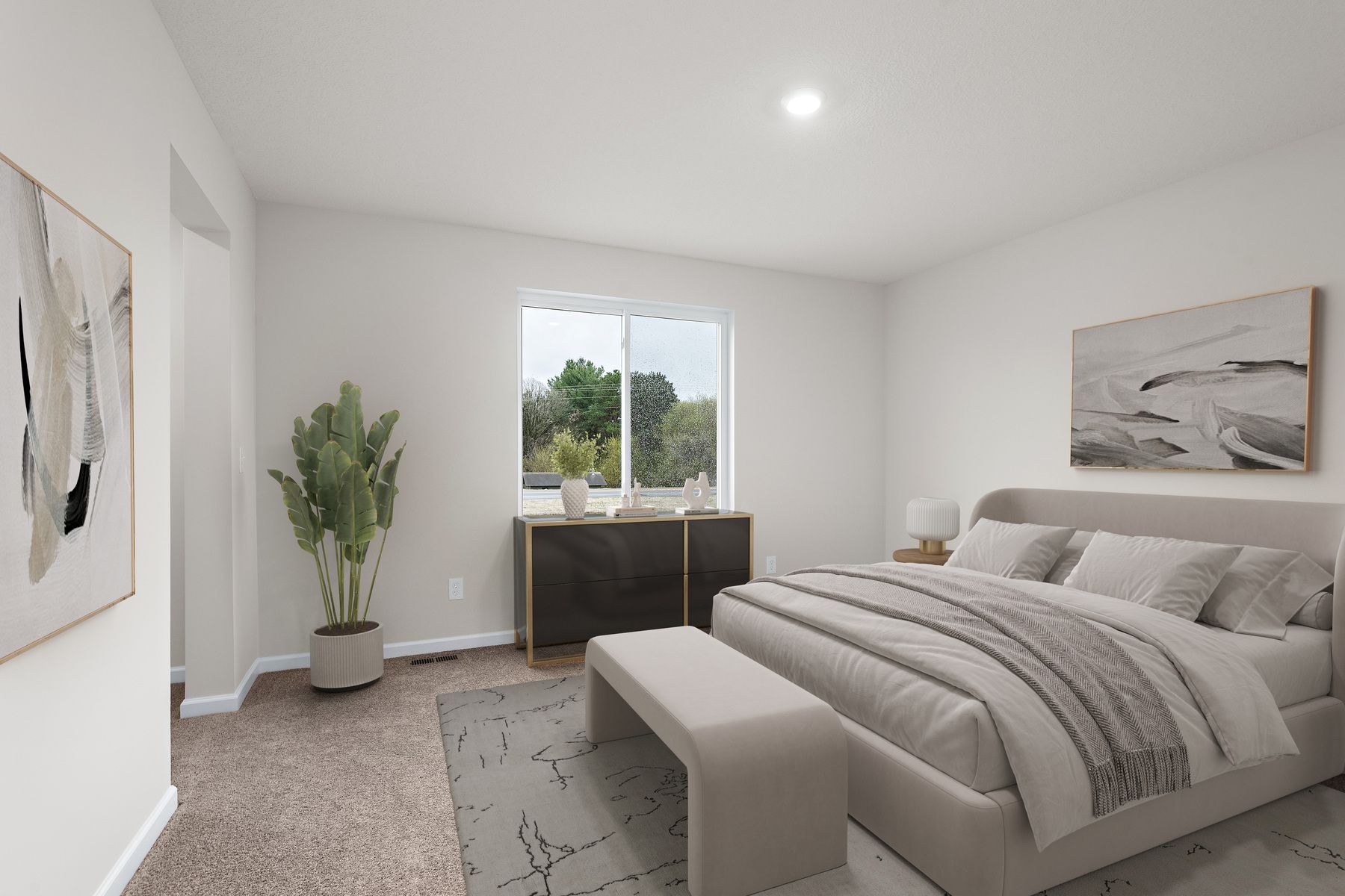 The master bedroom is spacious and has carpet.