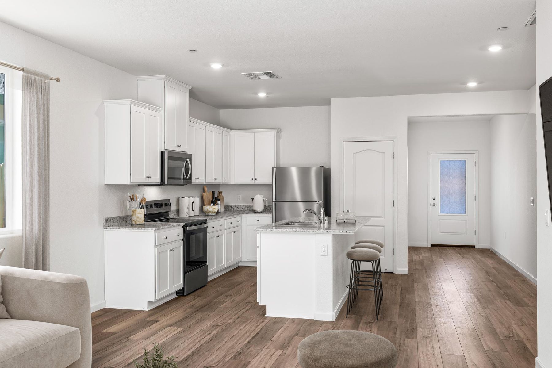 The kitchen appliances come included in this home.