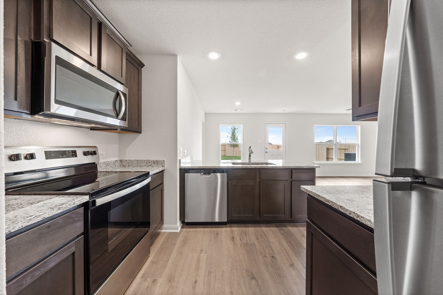 The kitchen of the Amelia has stainless-steel appliances.