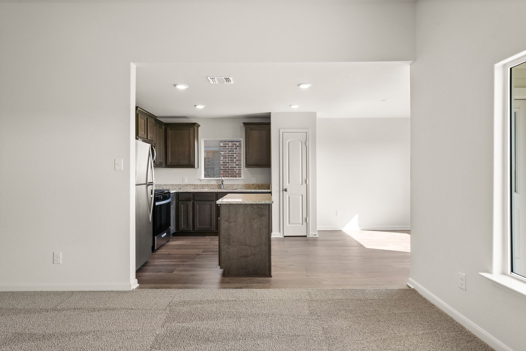 The dining room sits right off of the kitchen.