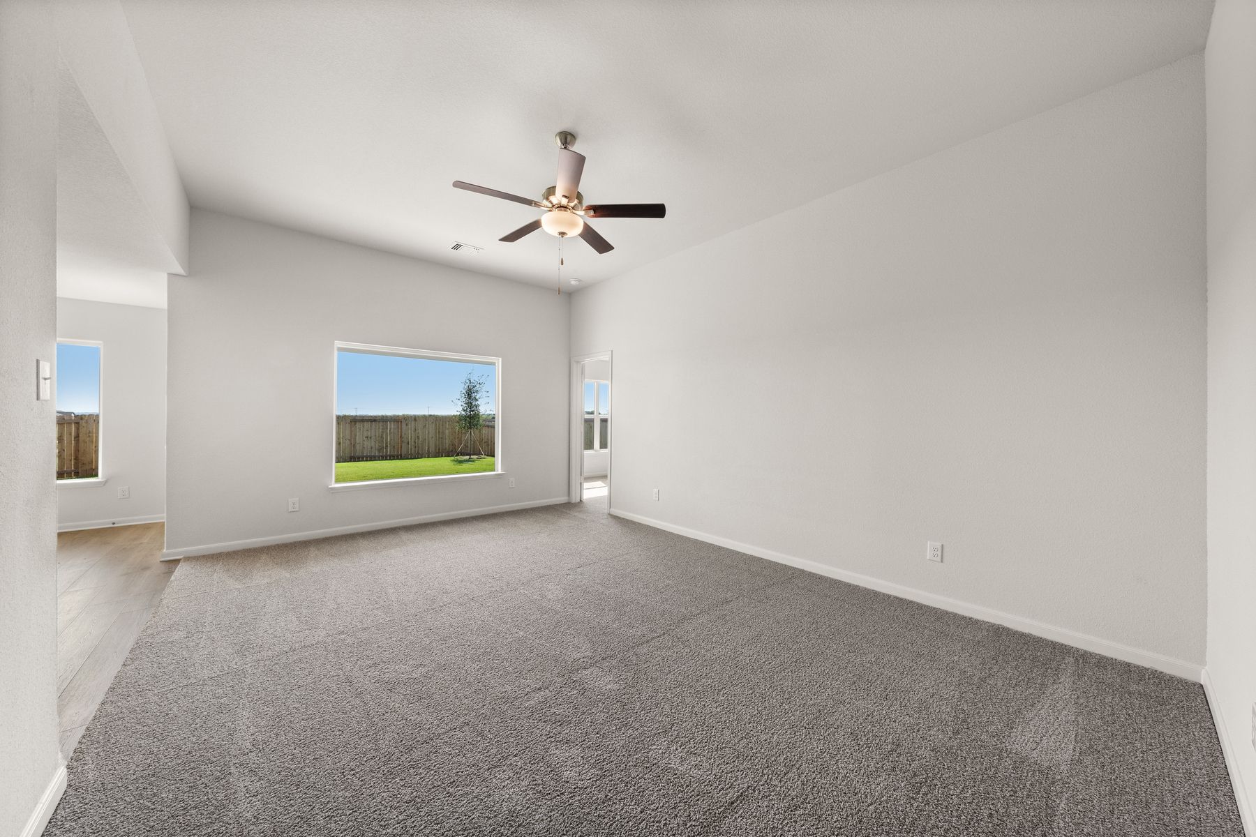 The master suite has a large bedroom, ensuite bathroom and walk-in closet.