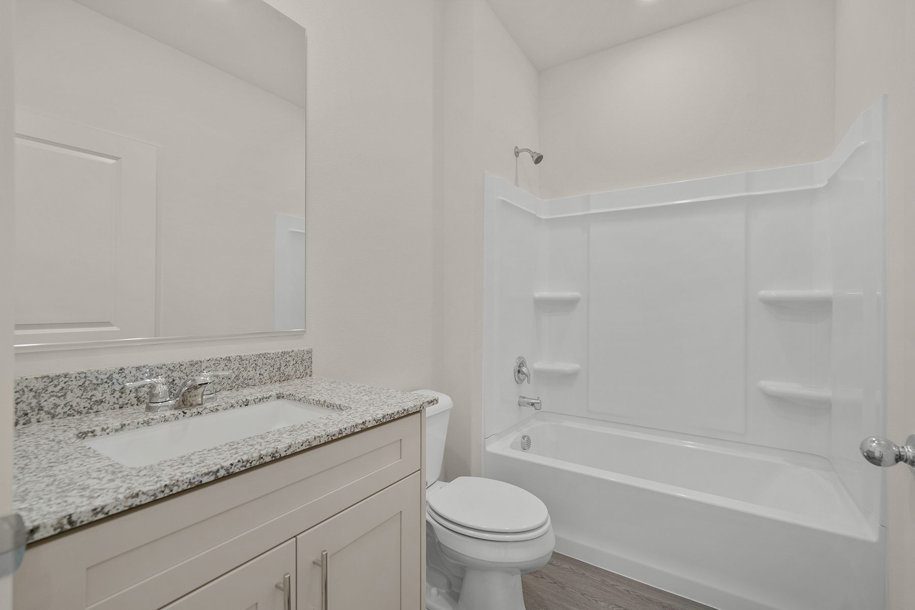 The secondary bathroom has the tub/shower combo.