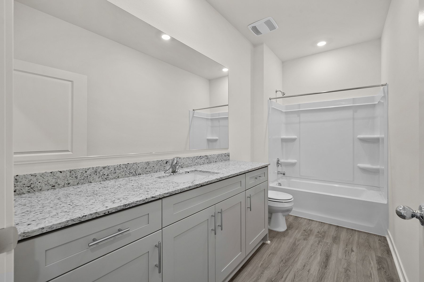 The secondary bathroom has the tub/shower combo.