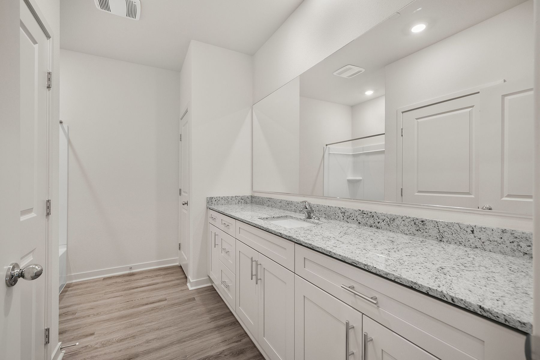The secondary bathroom has the tub/shower combo.