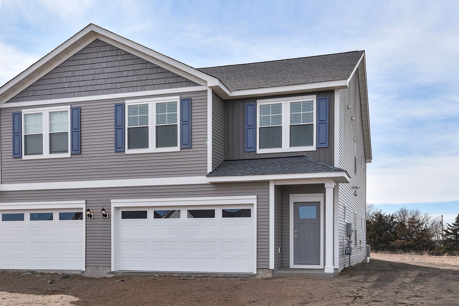 The Mayfield is a beautiful two story home with siding,