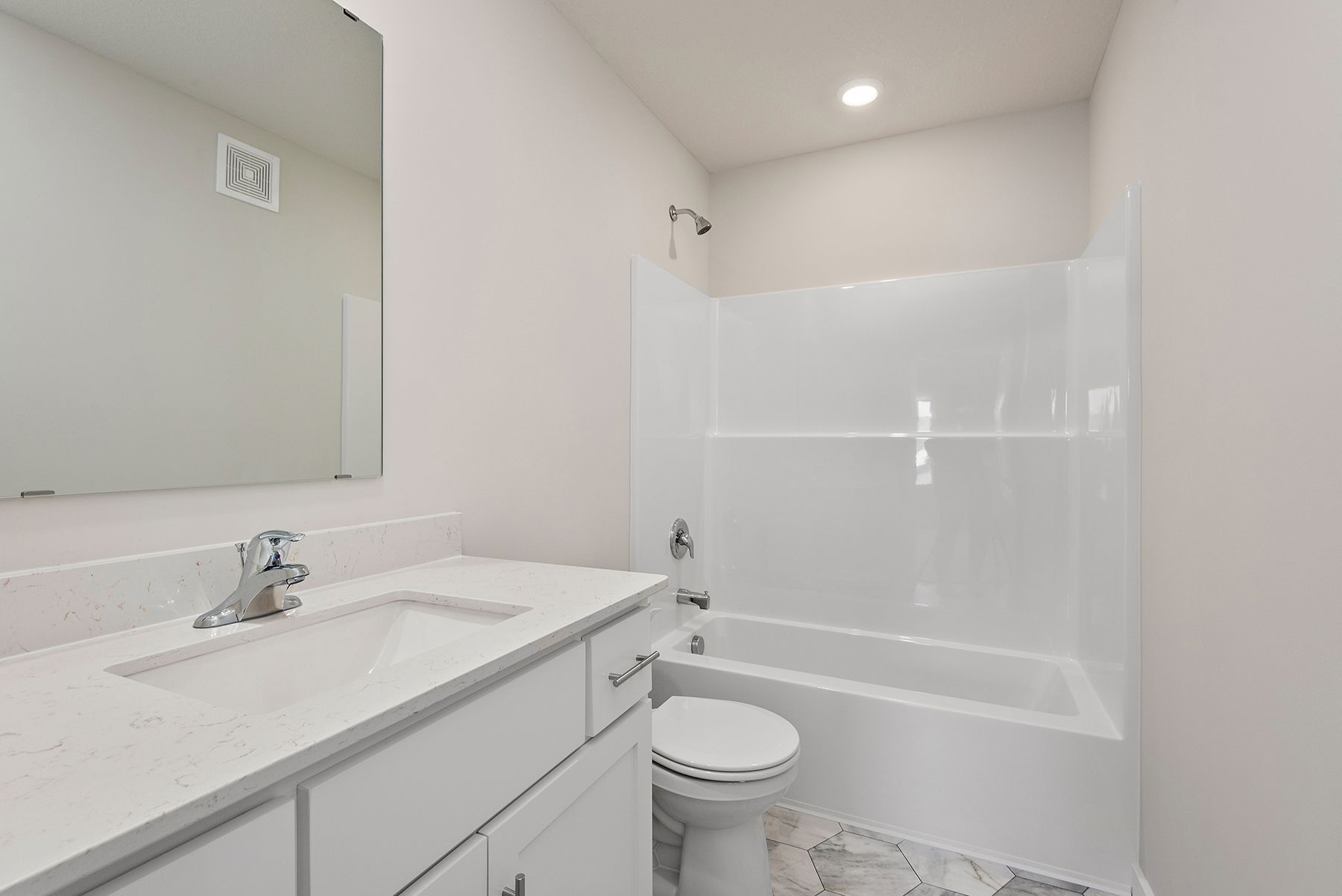 The secondary bathroom has the tub/shower combo.