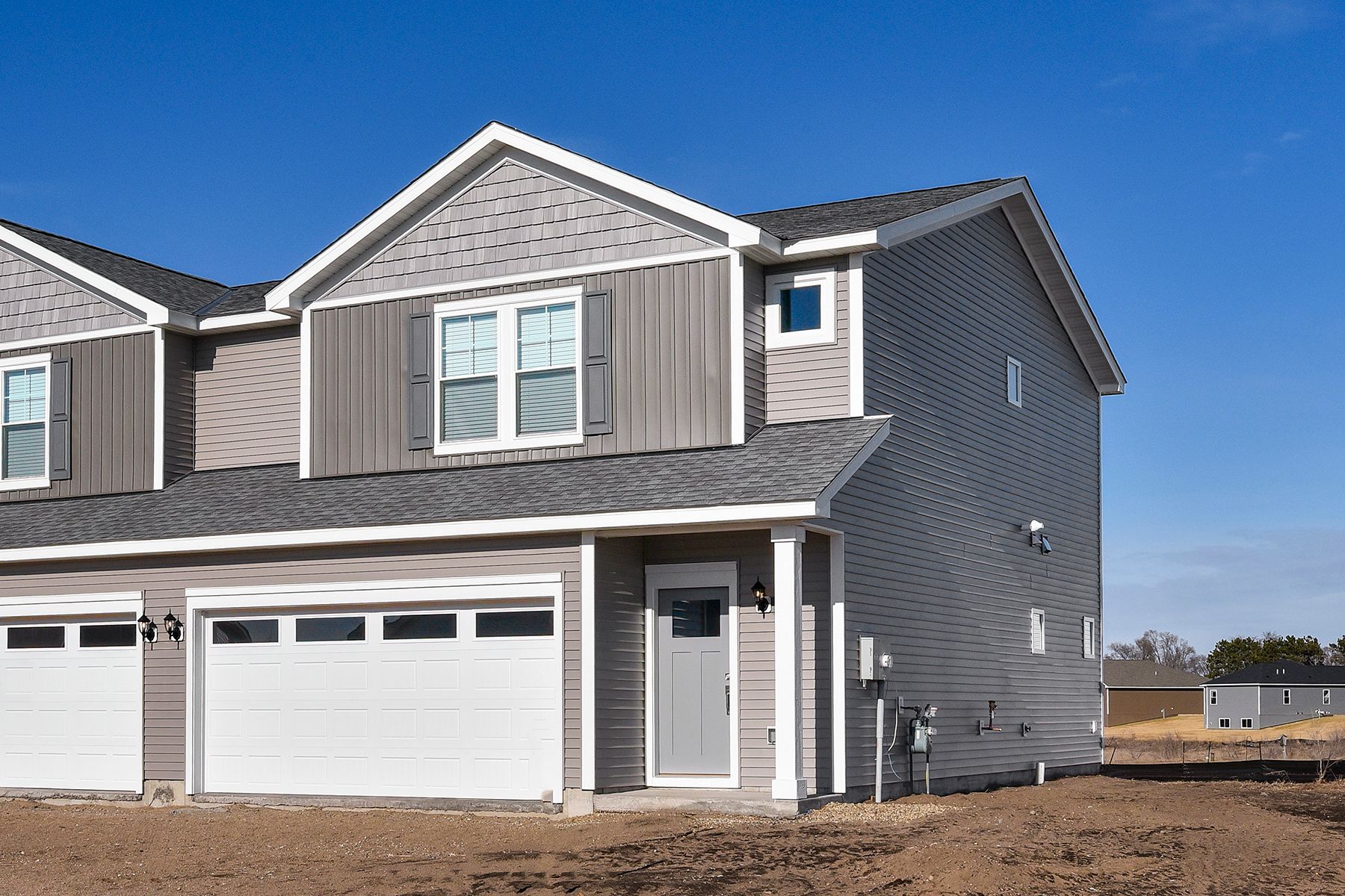 The  Foster is a beautiful two story home with siding.
