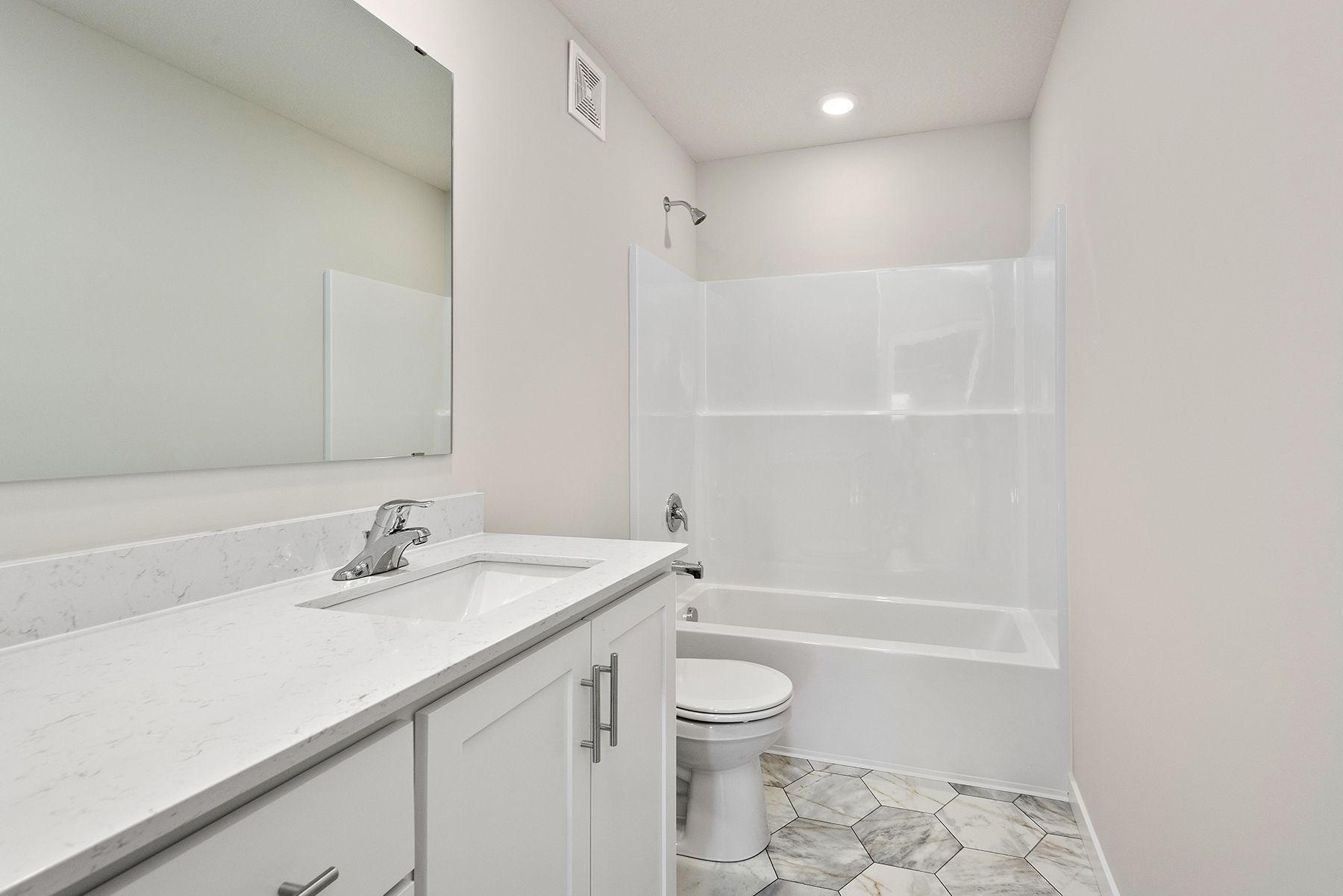 The secondary bathroom has the tub/shower combo.