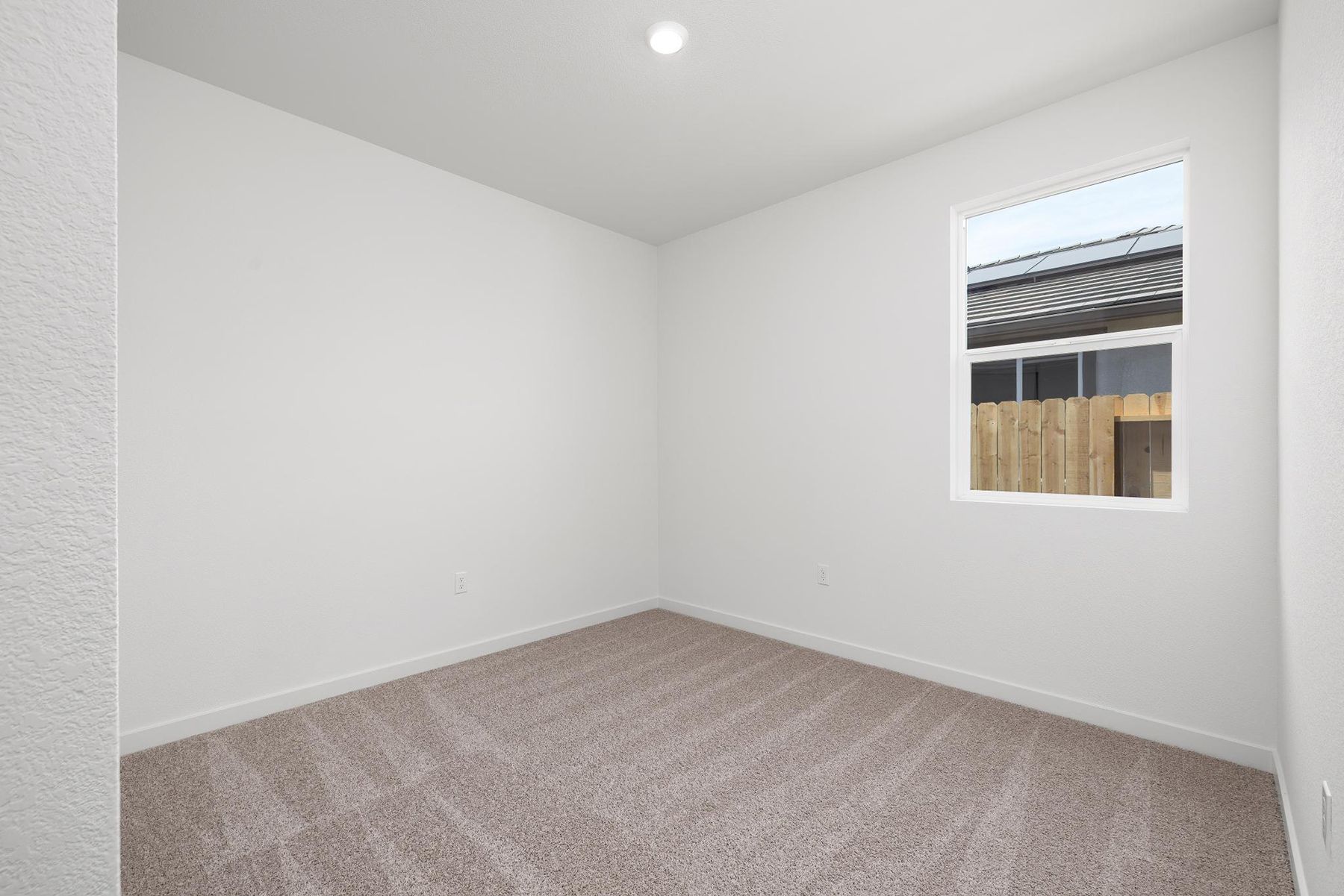 The secondary bedrooms have carpet.