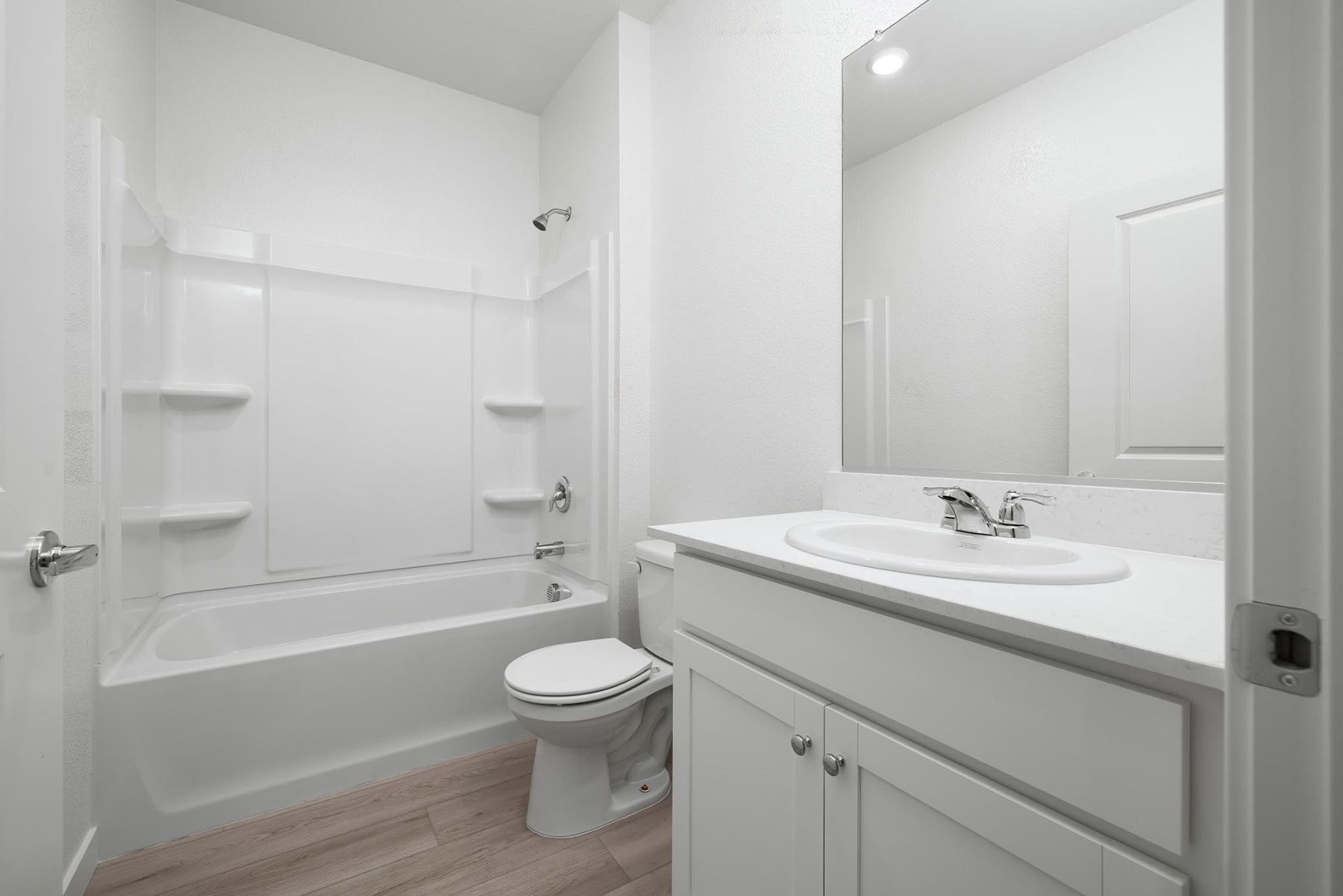 The secondary bathroom has the tub/shower combo.