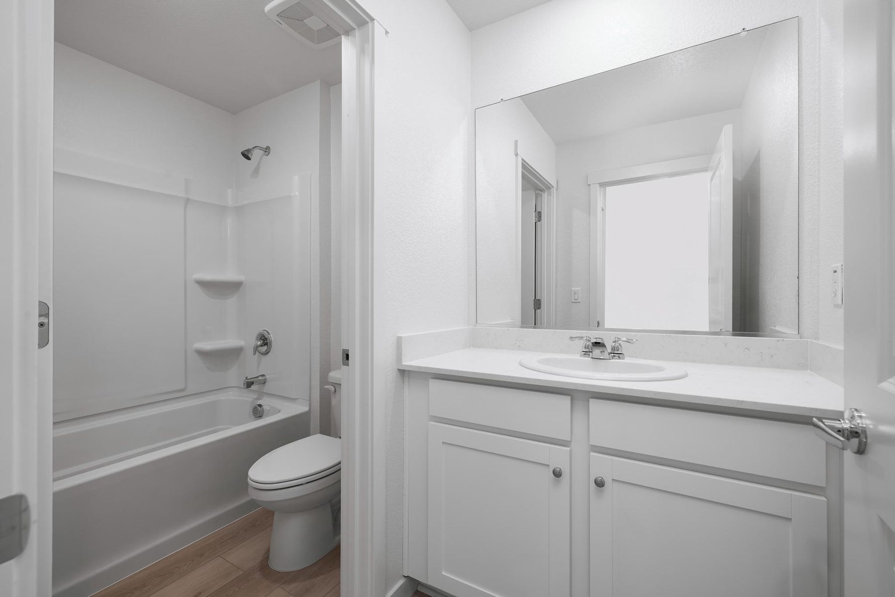 The tertiary bathroom has a tub/shower combo.