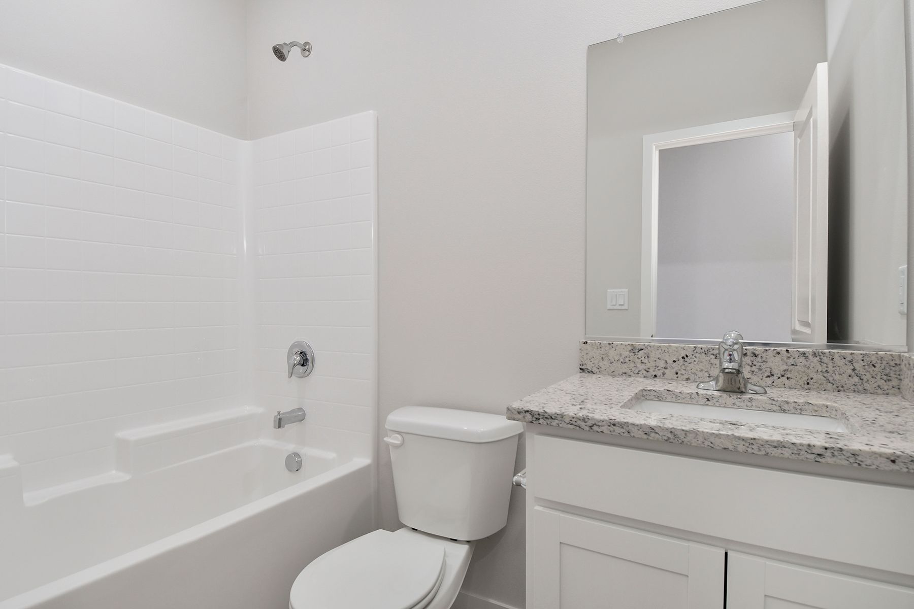 The secondary bathroom has the tub/shower combo.