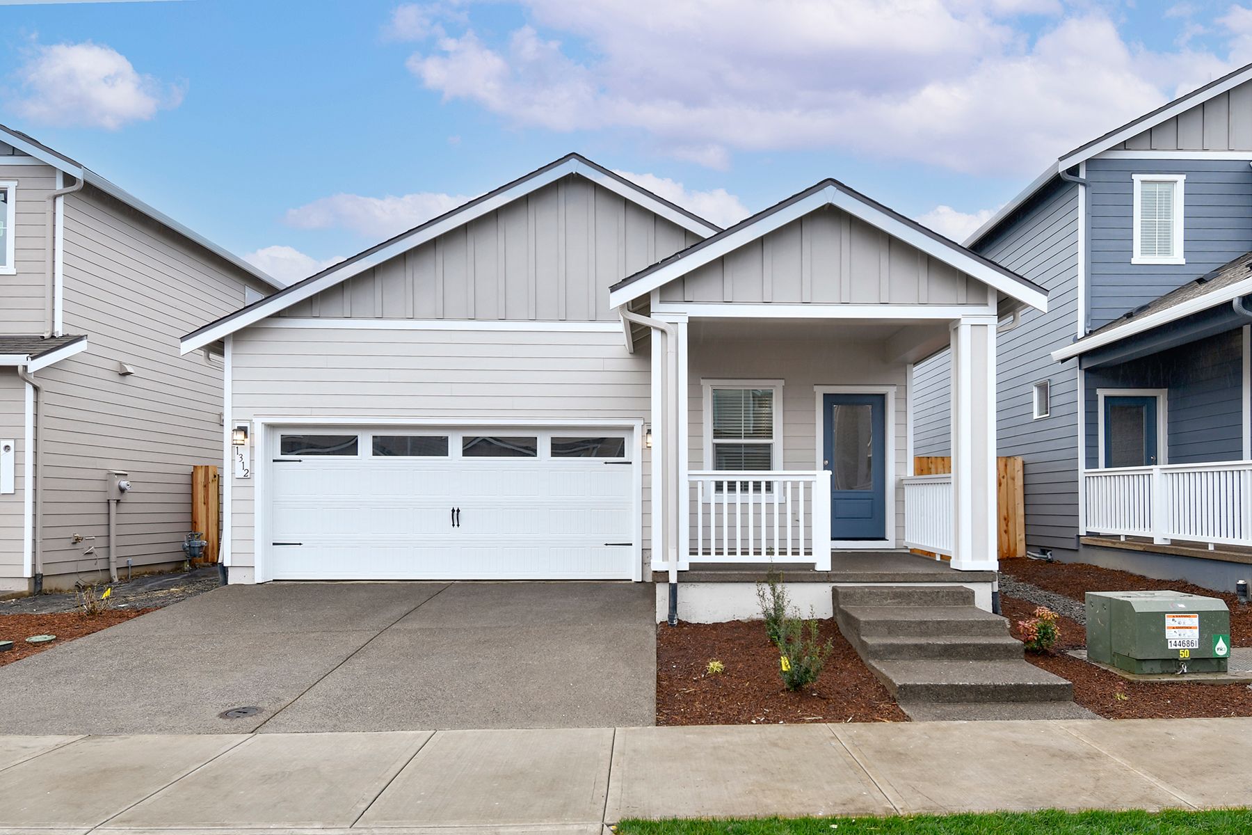 The Aspen is a beautiful single story home with siding.