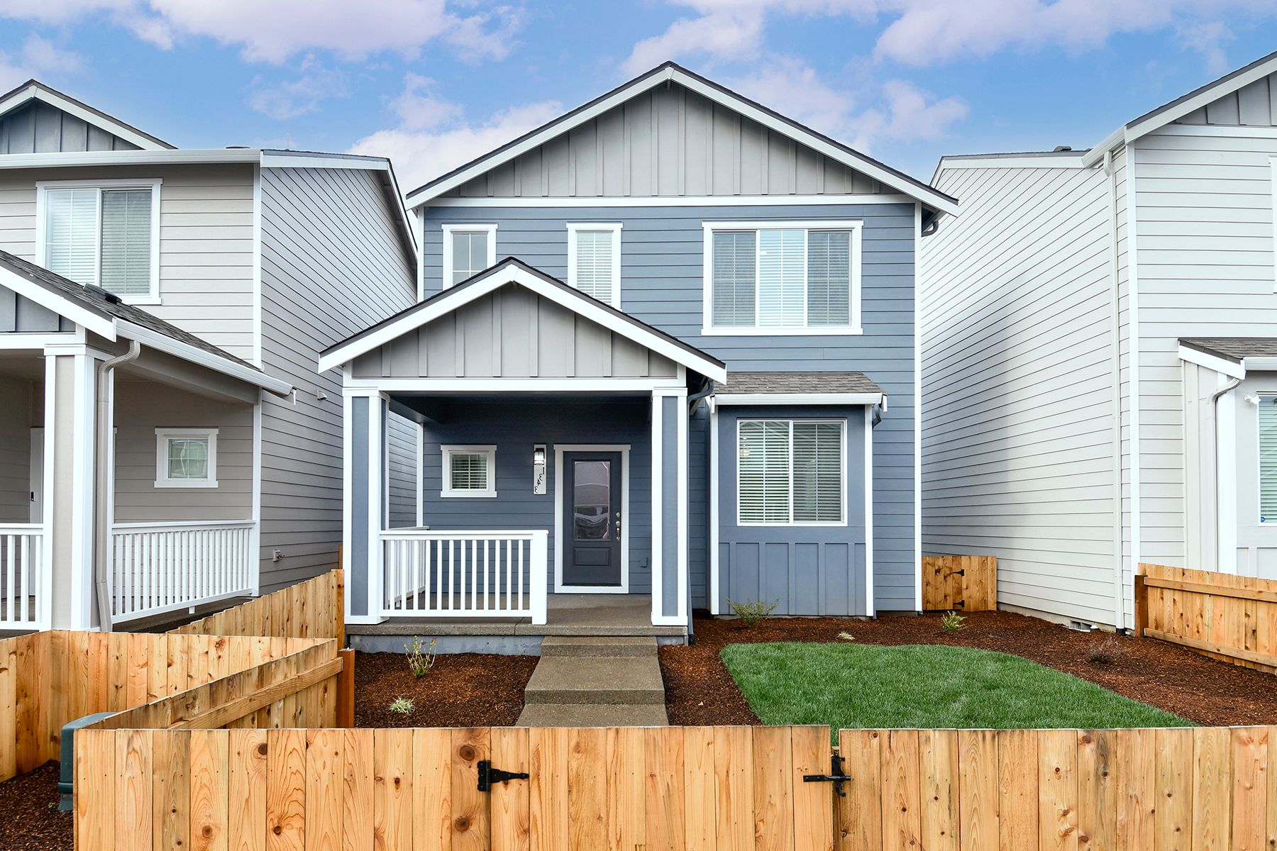 The Cayuse is a beautiful two story home with siding.