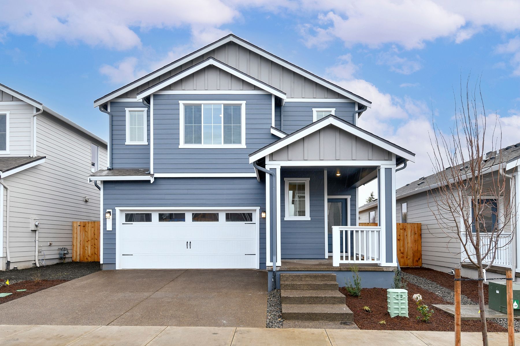 The Hawthorn is a beautiful two story home with siding.