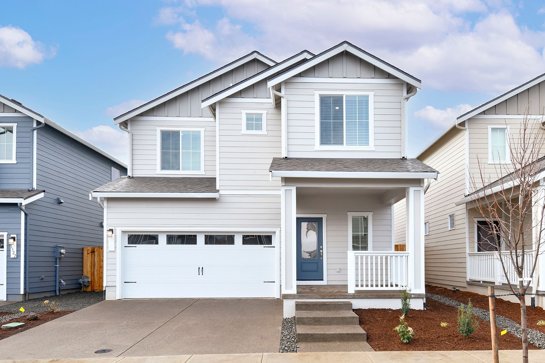 The Larch is a beautiful two story home with siding.