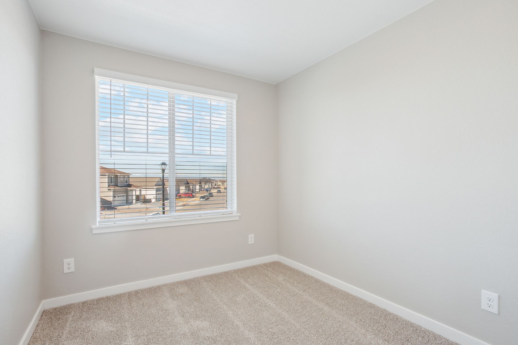 The secondary bedrooms have carpet.