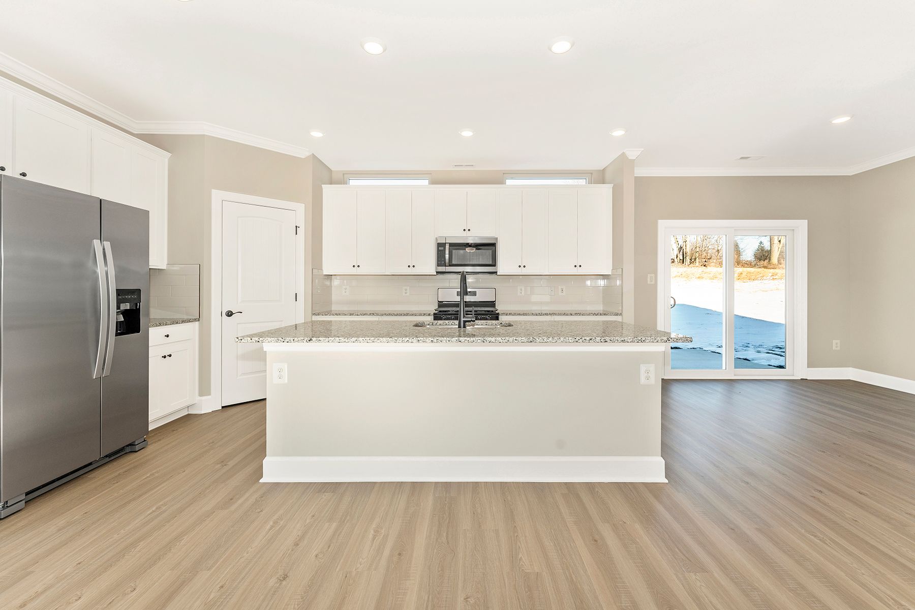 The kitchen comes with granite countertops