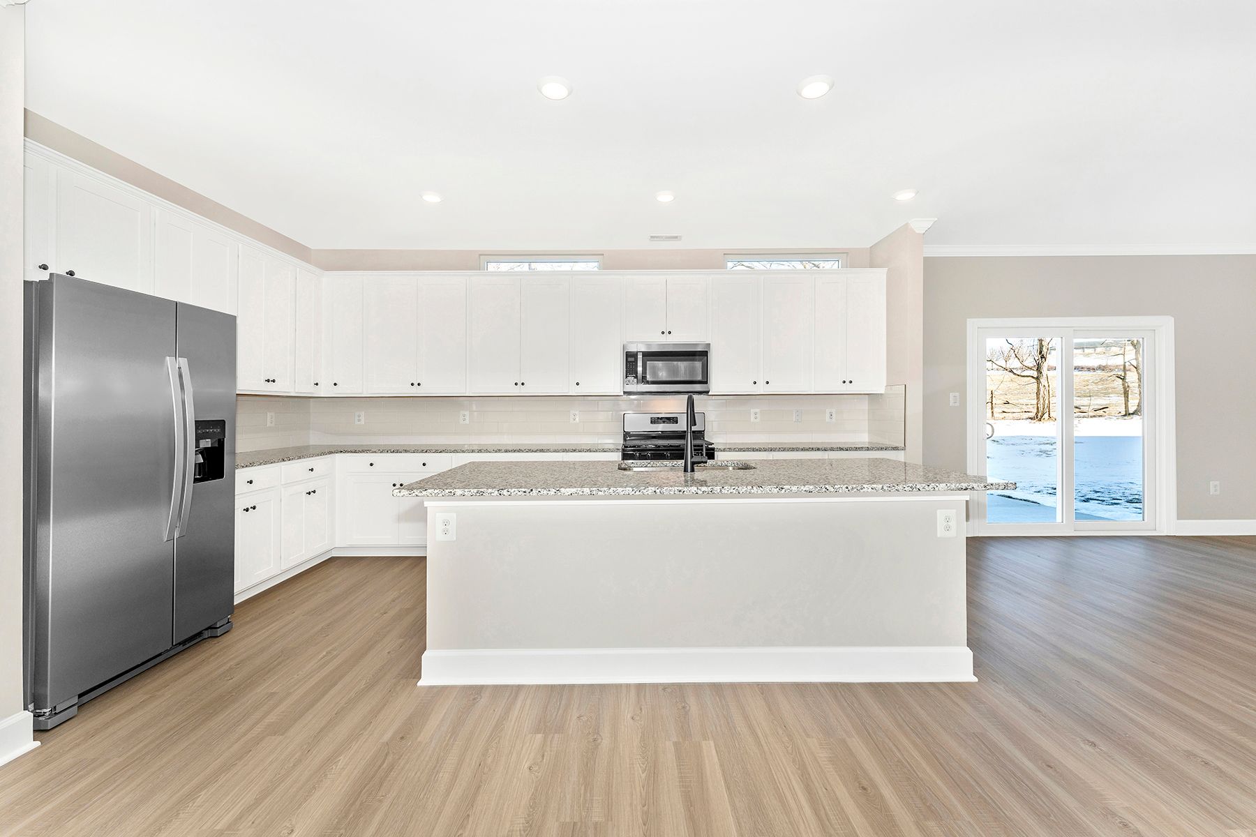 The kitchen has granite countertops