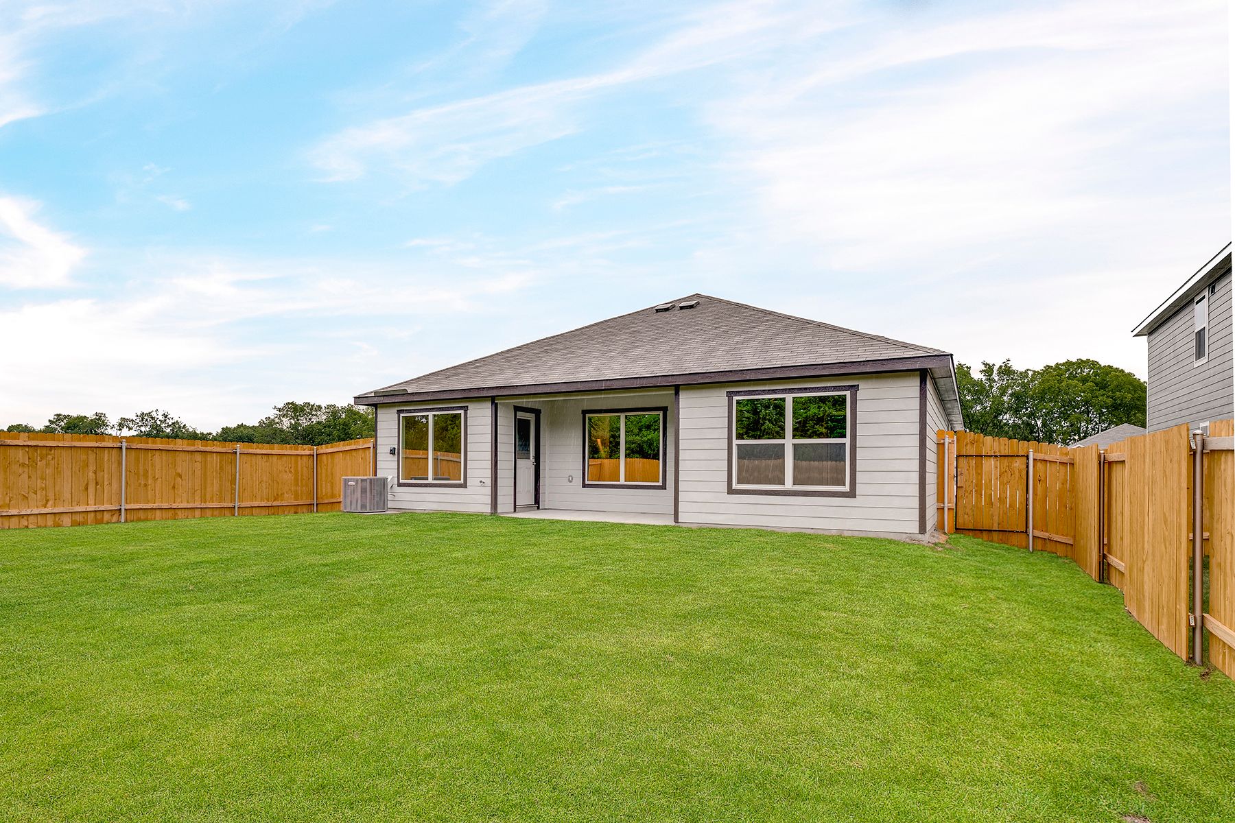 The back yard of the Blanco is fully fenced.