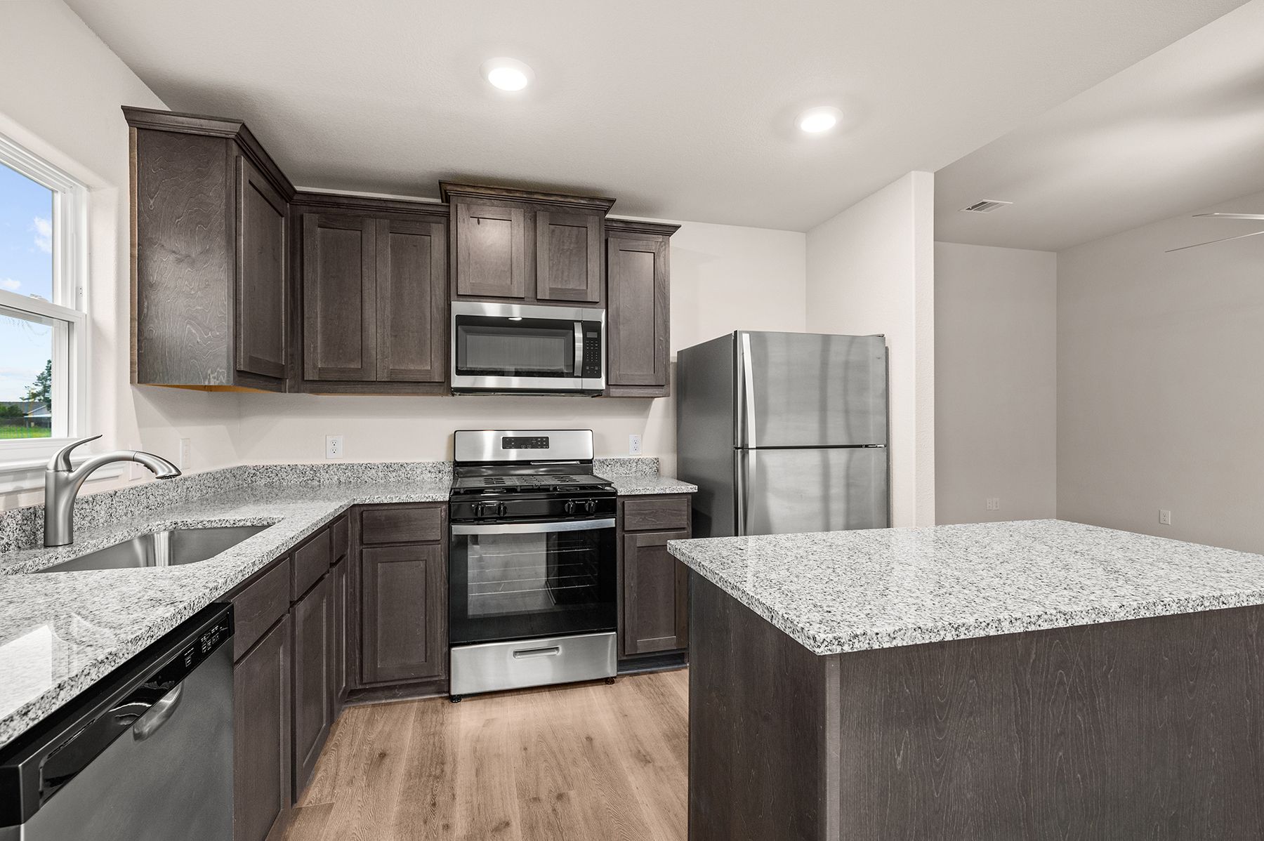 The kitchen has energy-efficient appliances.