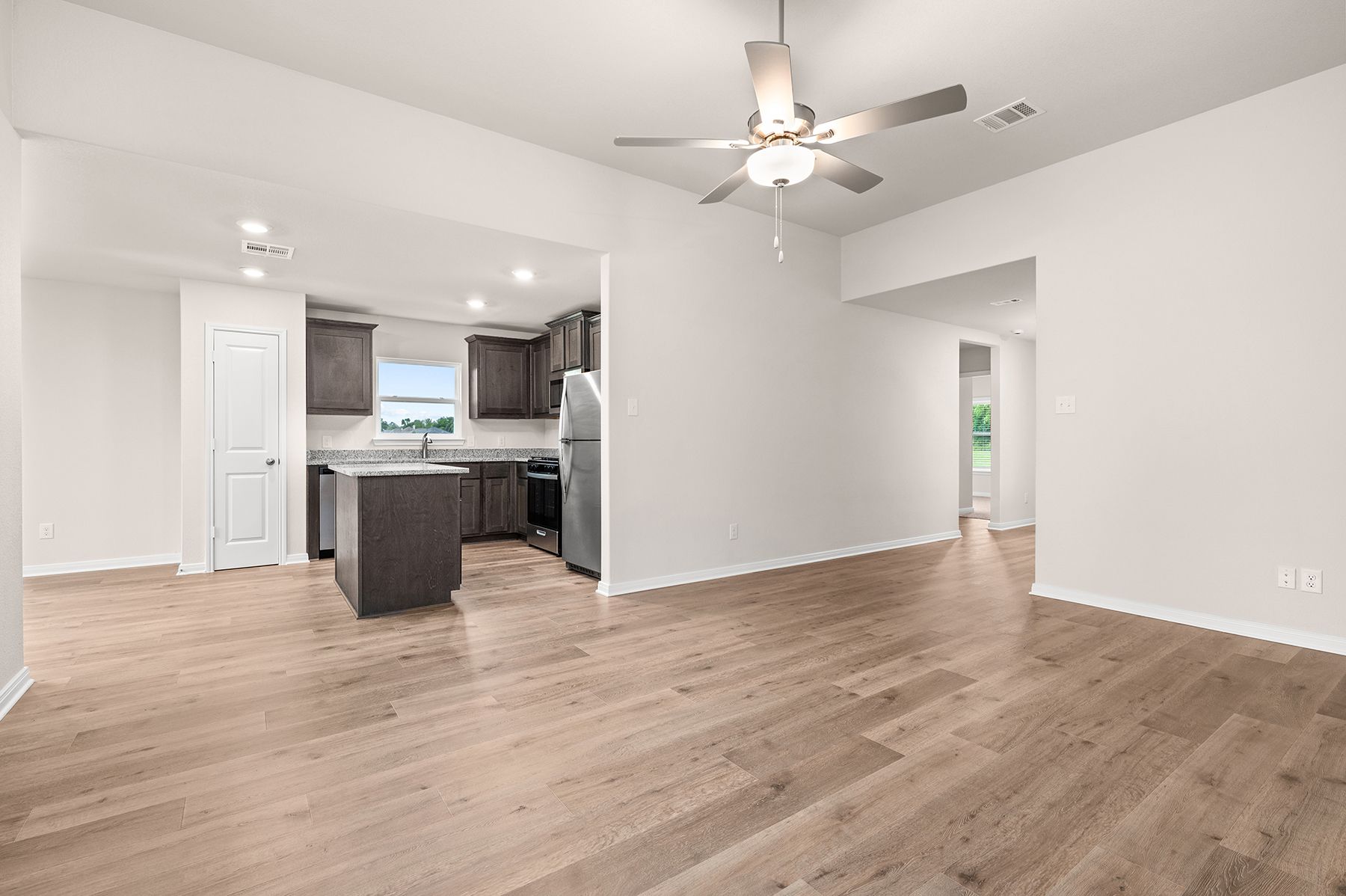 The family room connects to the kitchen and dining room.