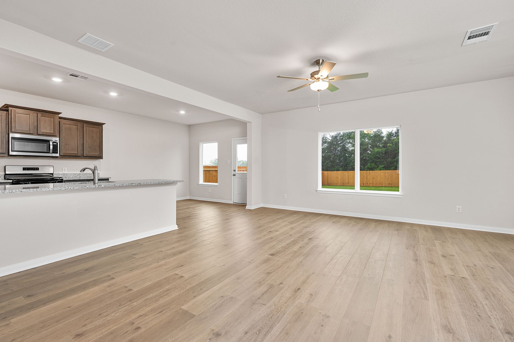 The family room sits adjacent to the kitchen and dining room.