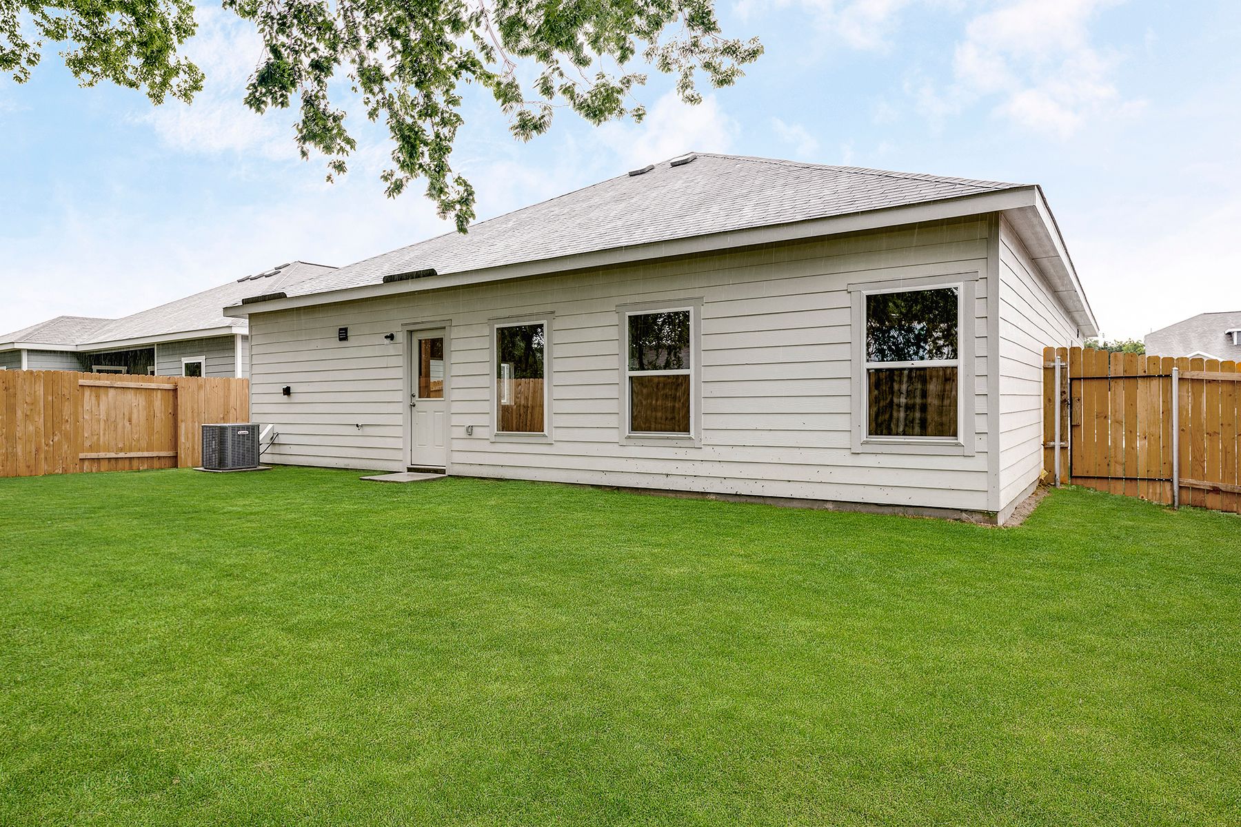 The Reed has a fully fenced-in backyard.