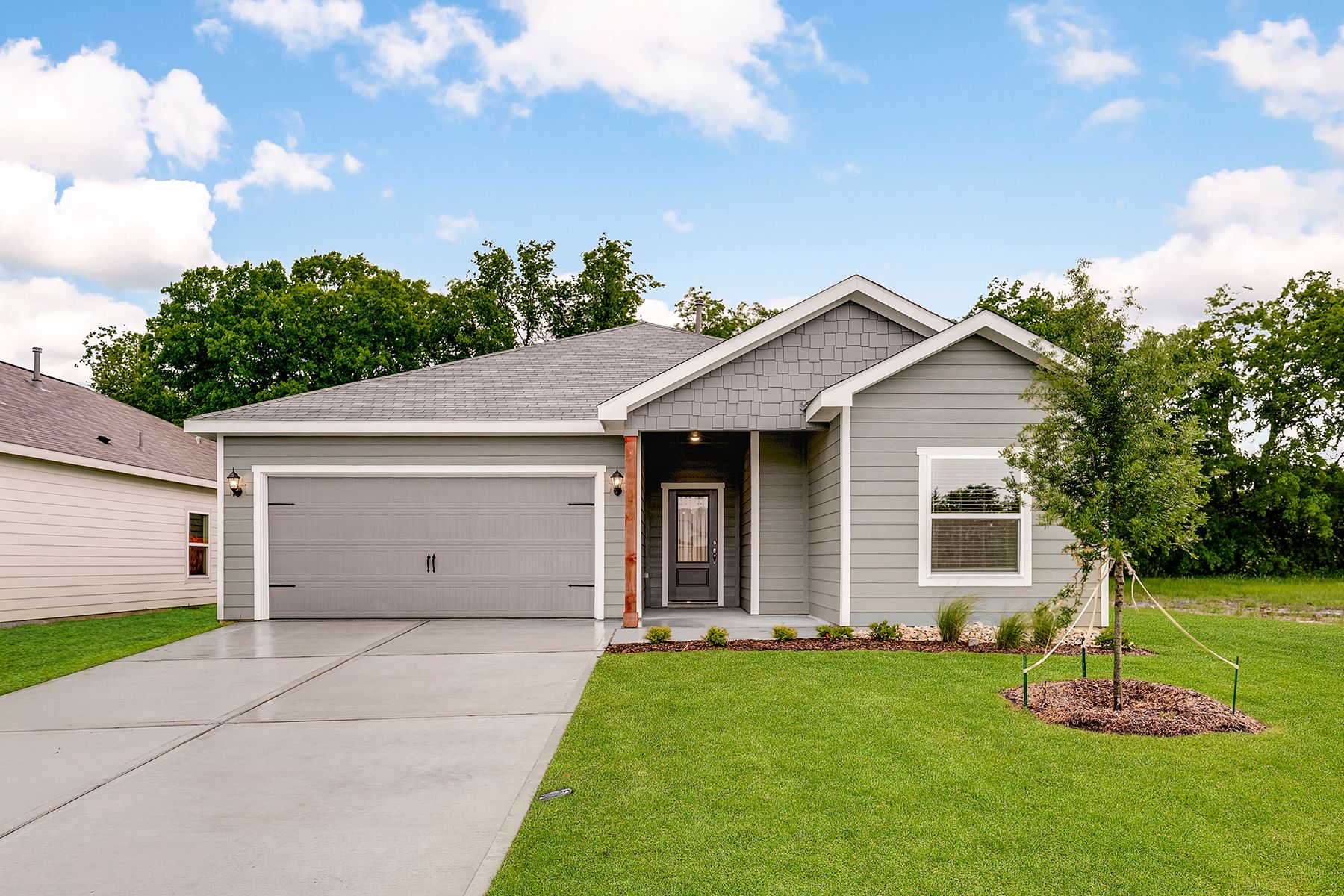 The Sabine is a beautiful one-story, siding home.