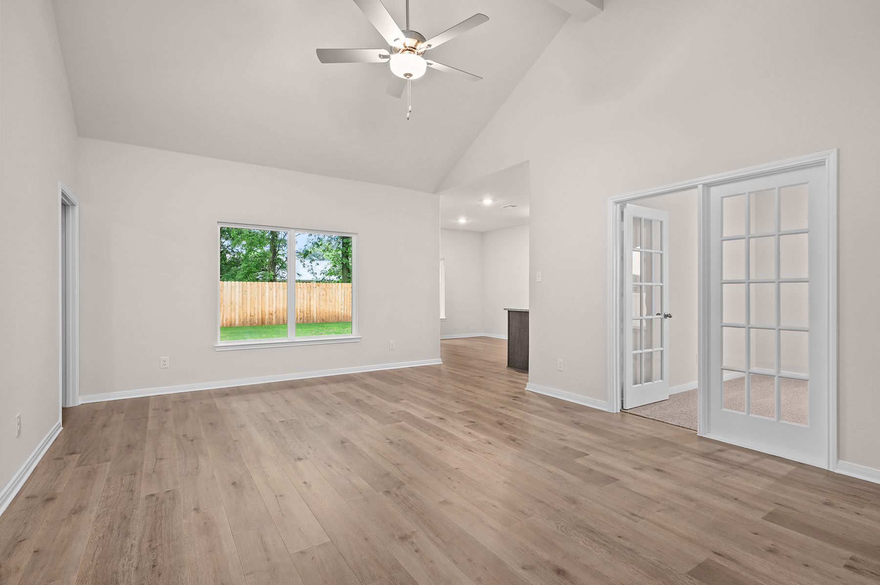 The family room of the Sabine has a large window.