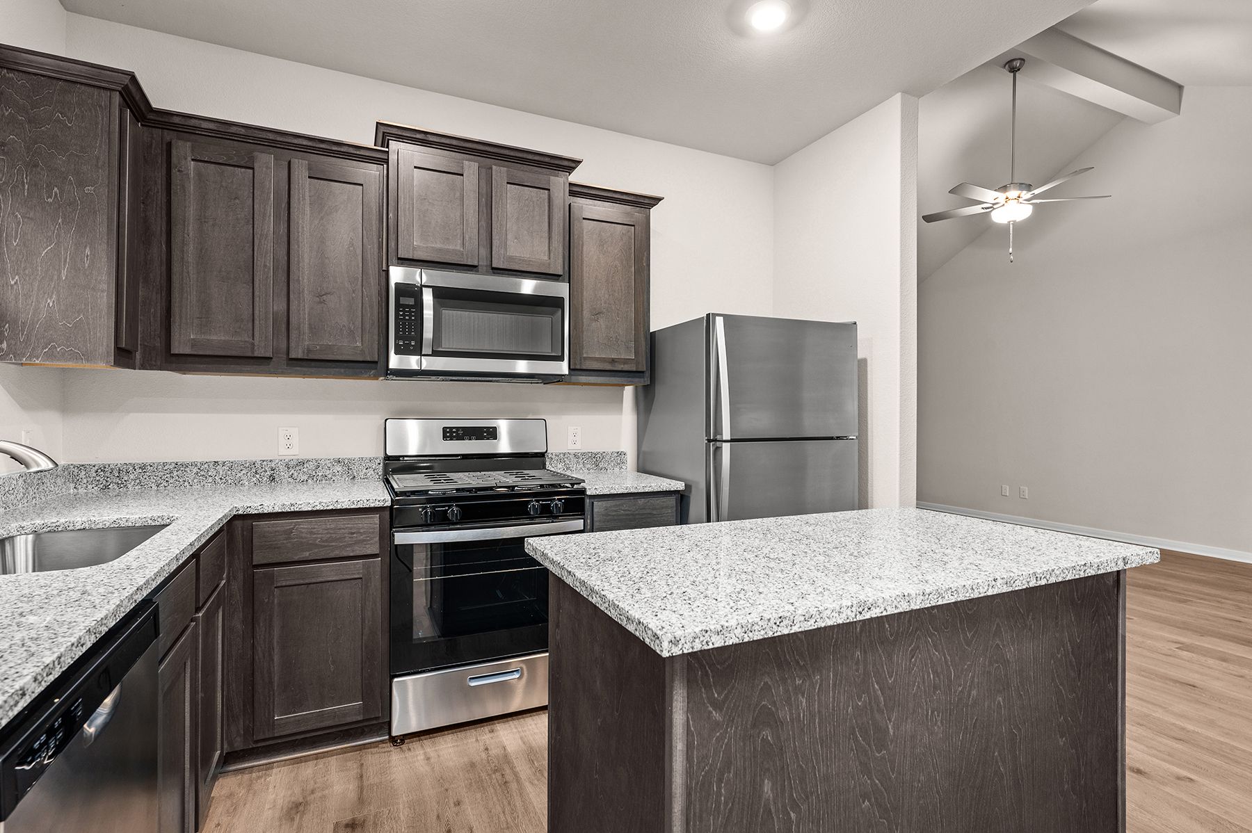 The kitchen of the Sabine has sprawling granite countertops.