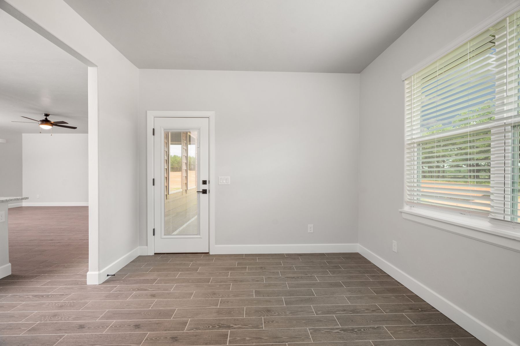 The dining room sits right off of the kitchen.