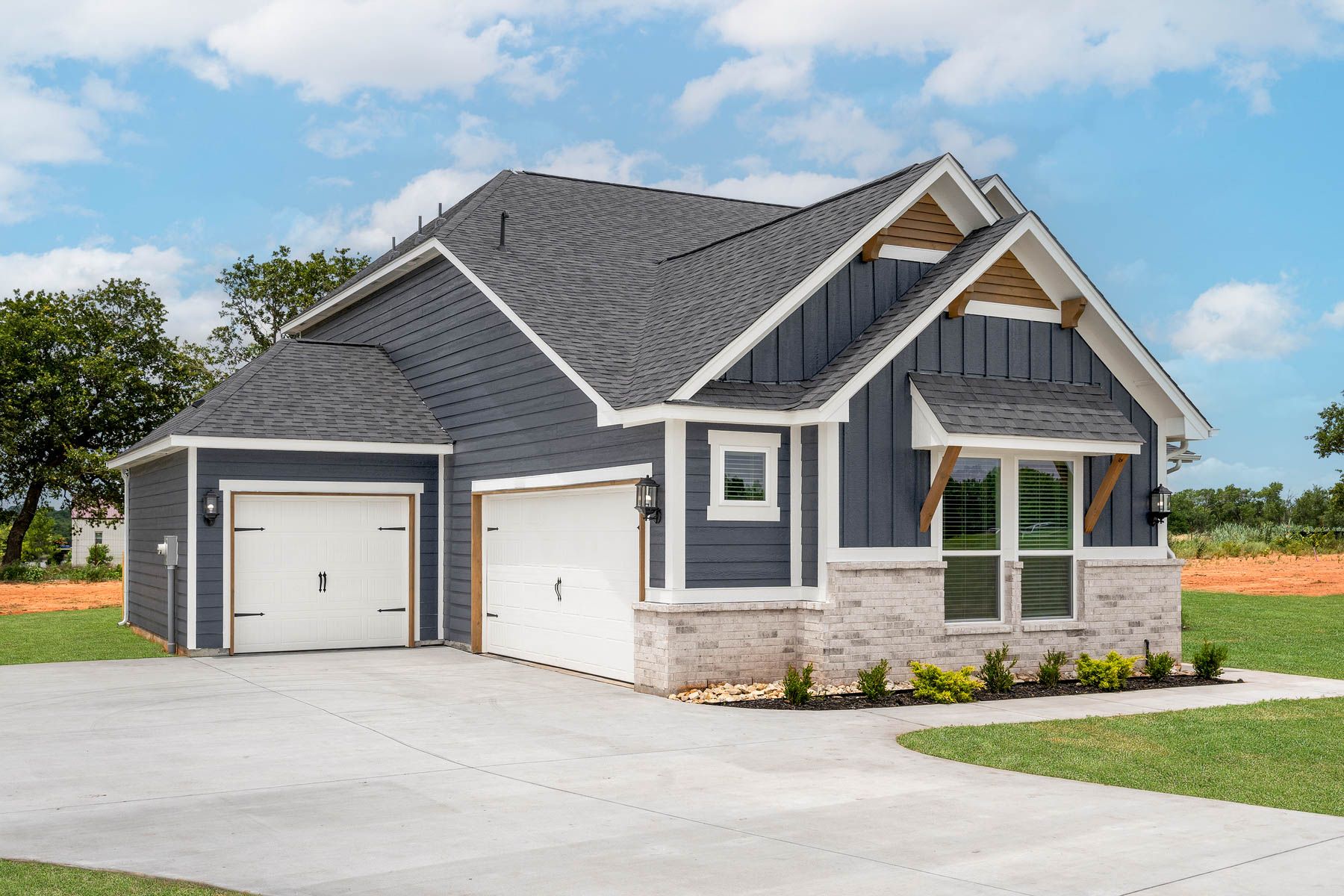 The Nicklaus plan has one and two story garages.
