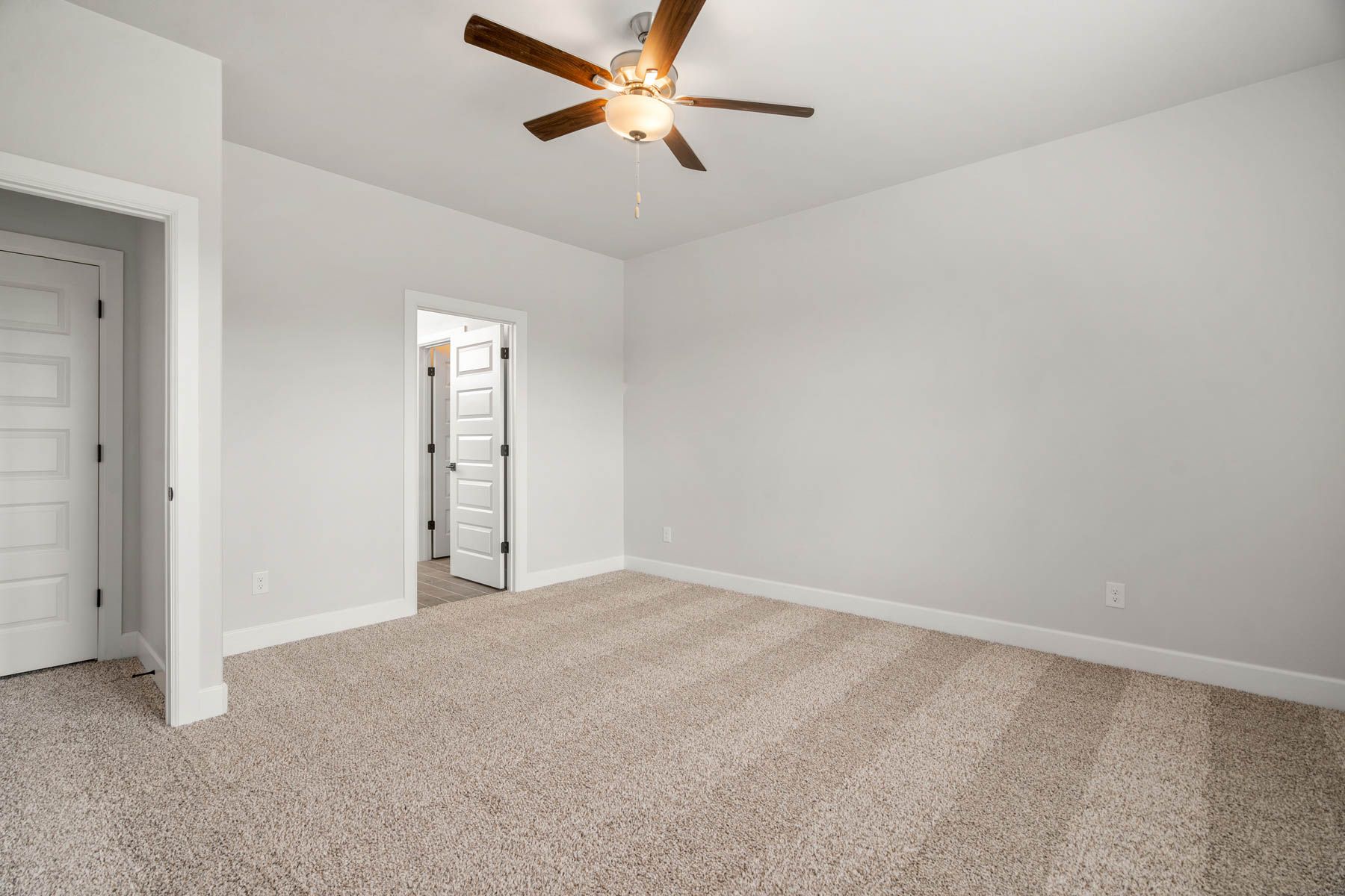 The master suite has a large bedroom, ensuite bathroom and walk-in closet.
