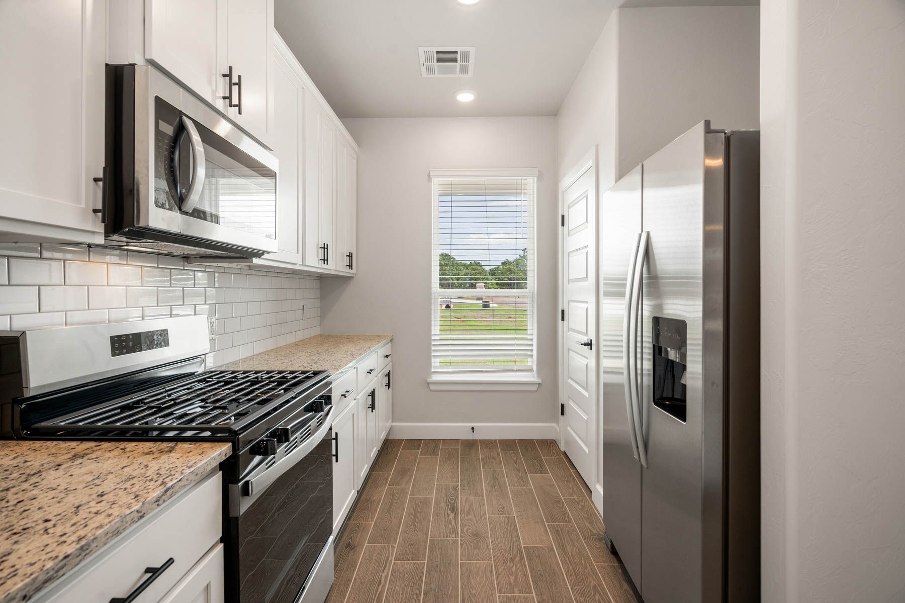 The kitchen has energy-efficient appliances.